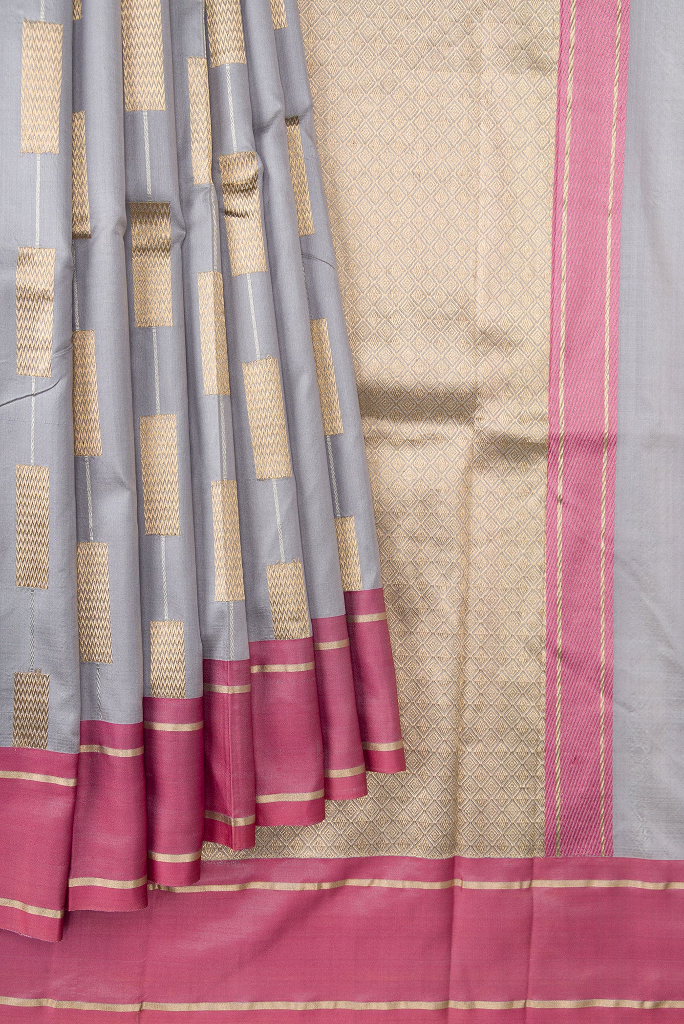 Pleats and pallu of Grey Dual Tone Banarasi Silk Saree with Stripes on the body and Zari Border. 