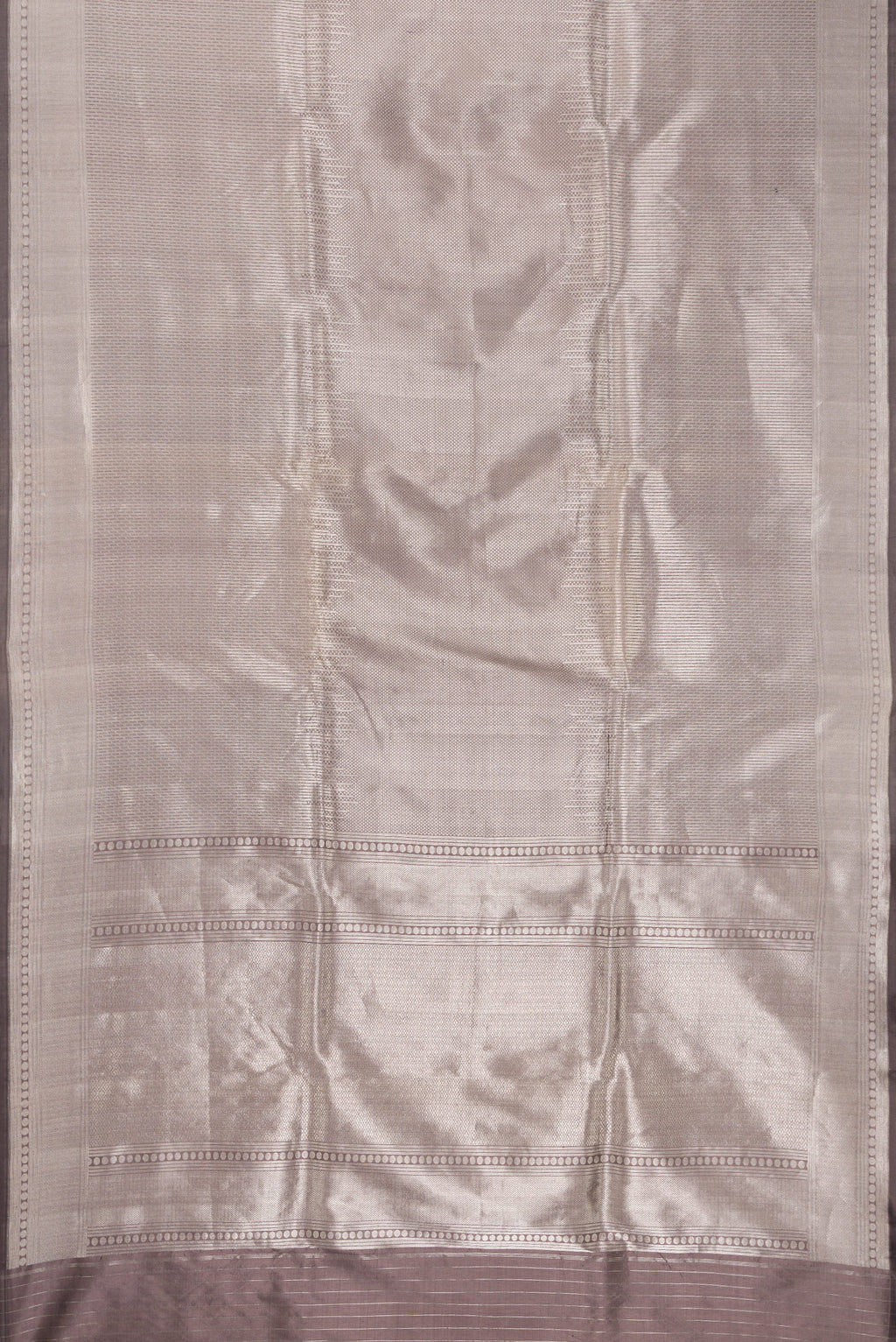 Flat view of Grey Dual Tone Banarasi Silk Saree with Zari Brocade on the body and Zari Border. 