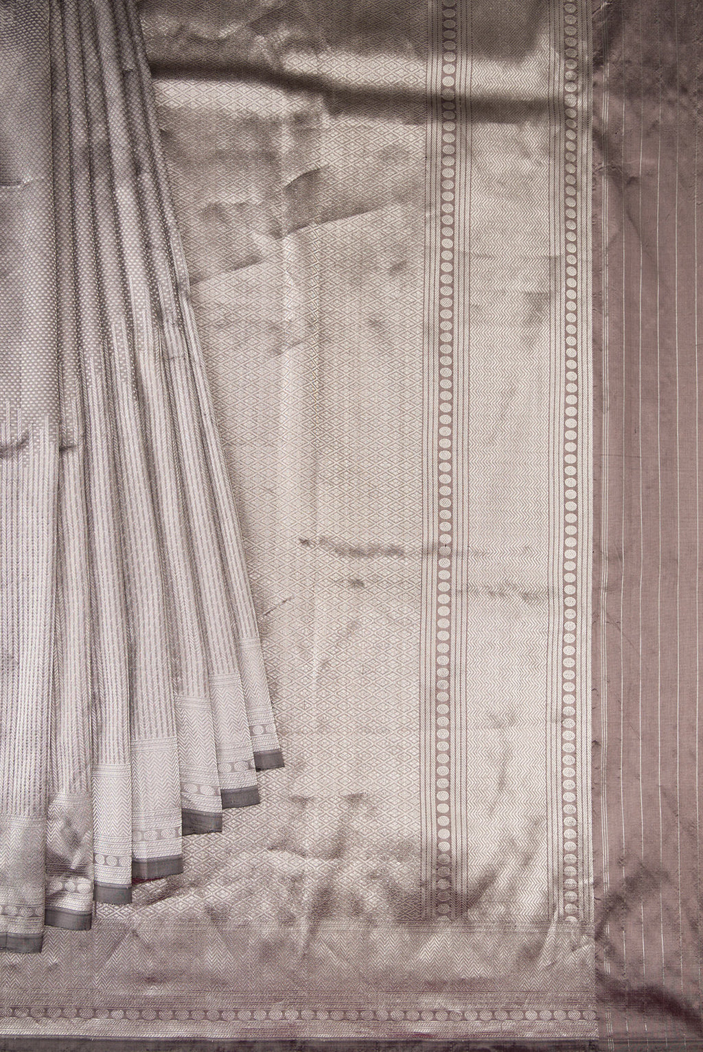 Pleats and pallu of Grey Dual Tone Banarasi Silk Saree with Zari Brocade on the body and Zari Border. 