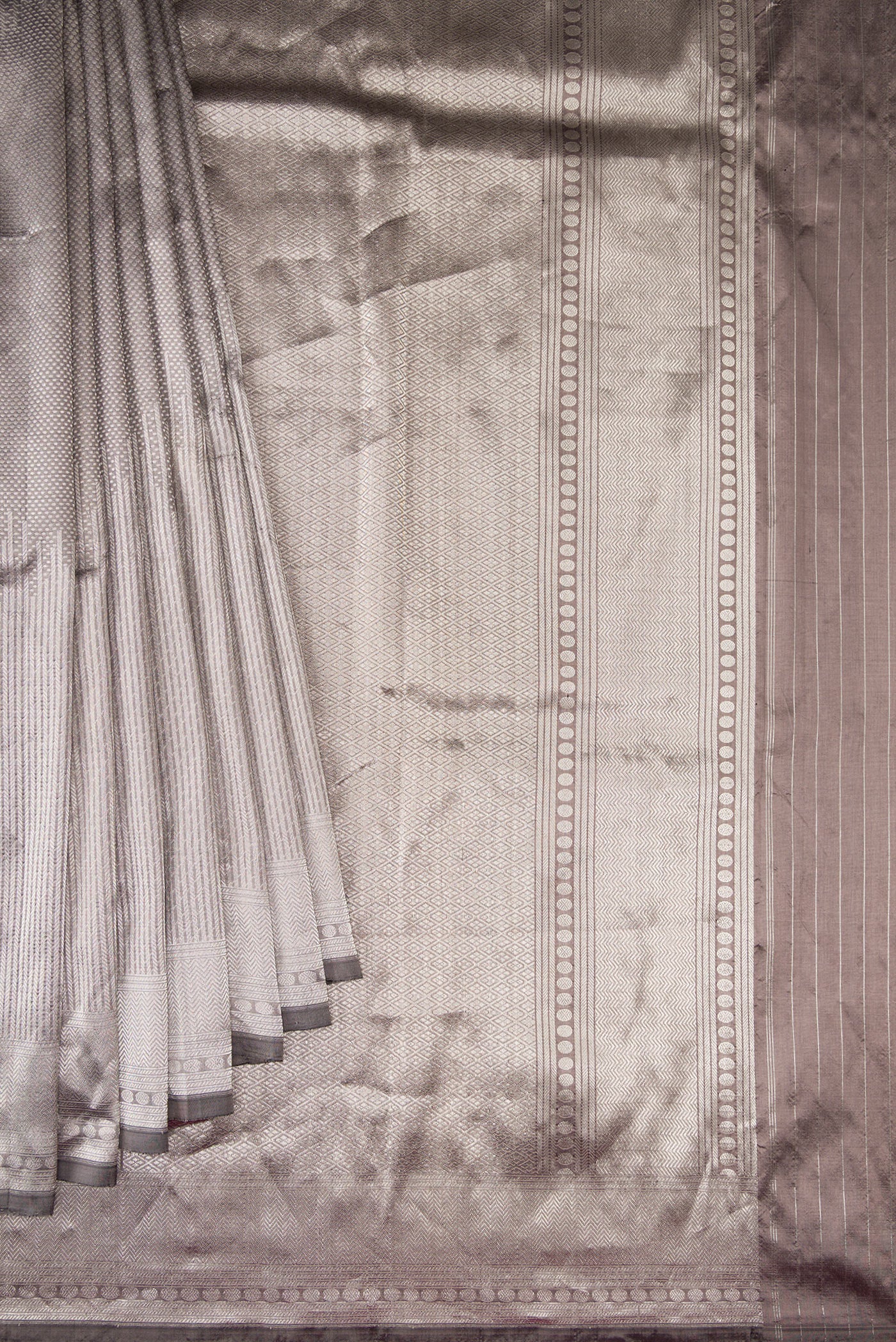 Pleats and pallu of Grey Dual Tone Banarasi Silk Saree with Zari Brocade on the body and Zari Border. 