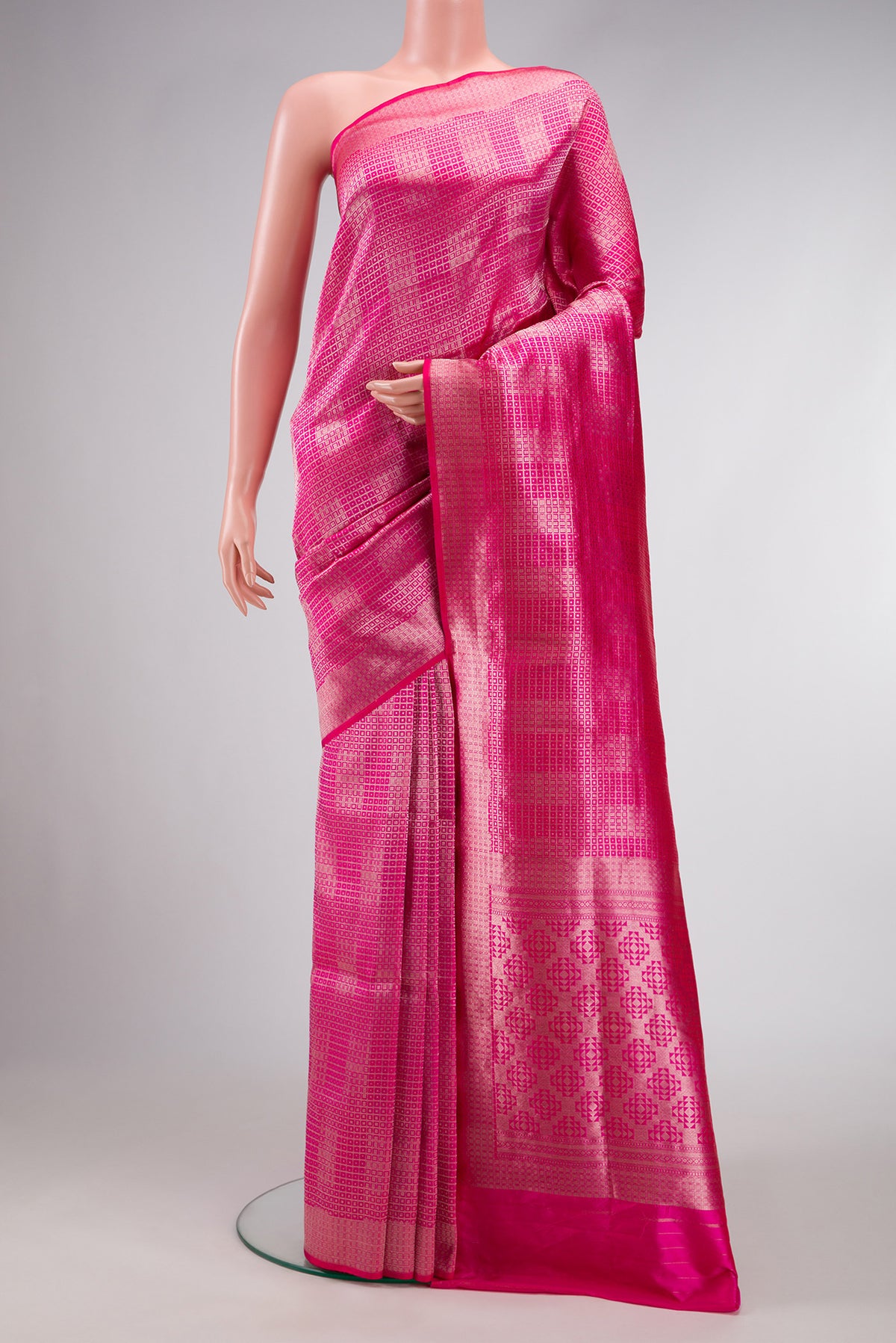 Pink Dual Tone Banarasi Silk Saree with Zari Brocade on the body and Zari Border.  displayed on a mannequin