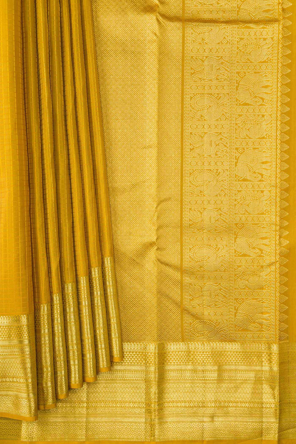 Pleats and pallu of Mustard Dual Tone Kanchipuram Silk Saree with Zari Butta on the body and Zari Border
