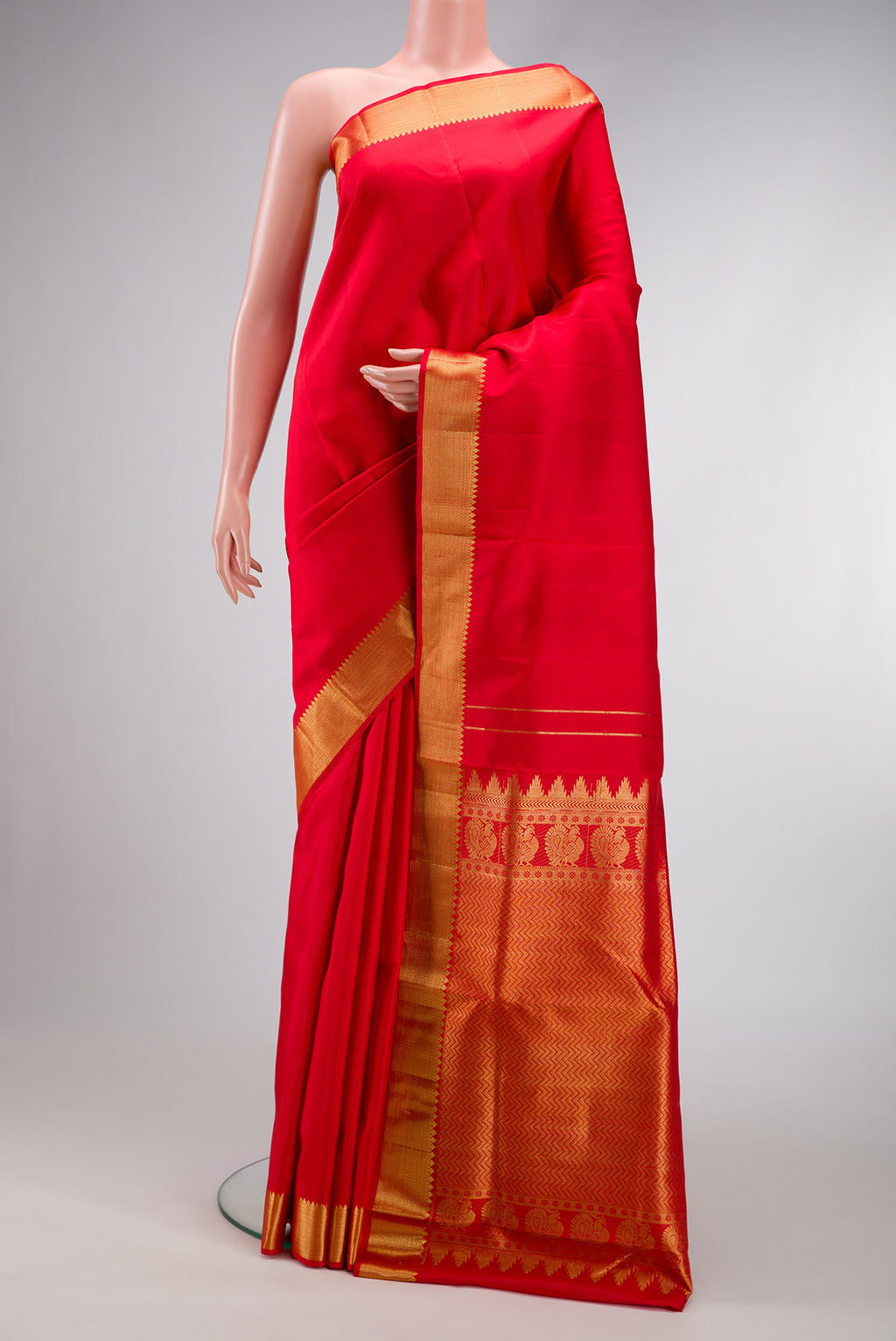Red Dual Tone Kanjivaram Silk Nine Yards Saree with Plain Body and Zari Border.  displayed on a mannequin