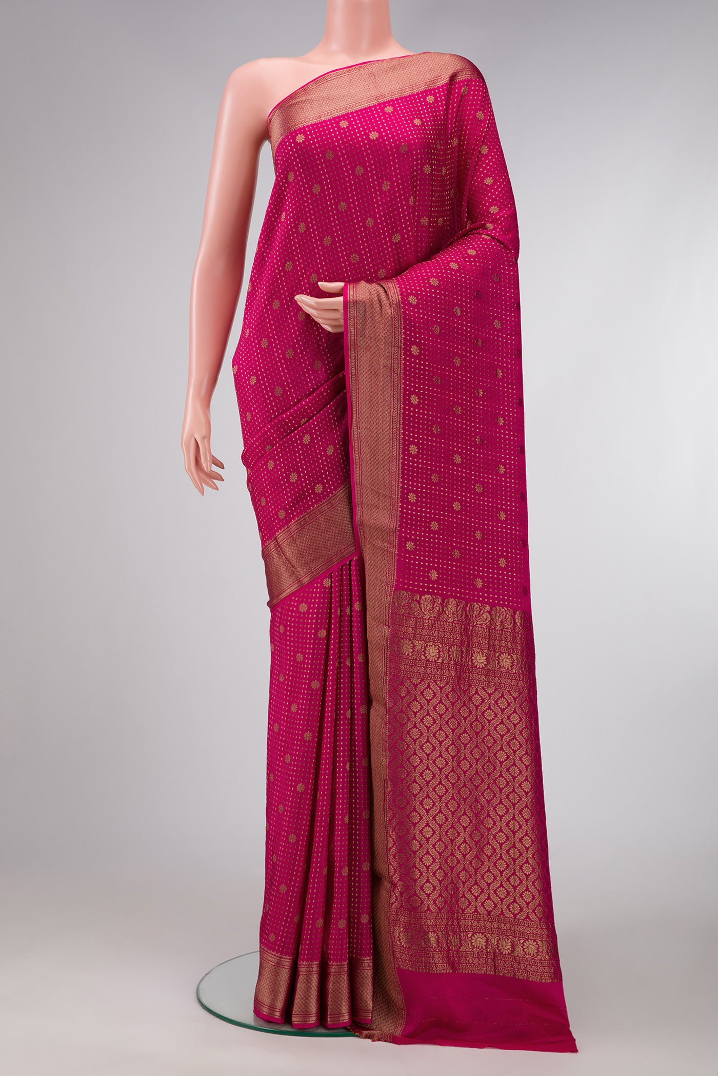 Dark Pink Dual Tone Banarasi Georgette Saree with Zari Butta on the body and Zari Border.  displayed on a mannequin