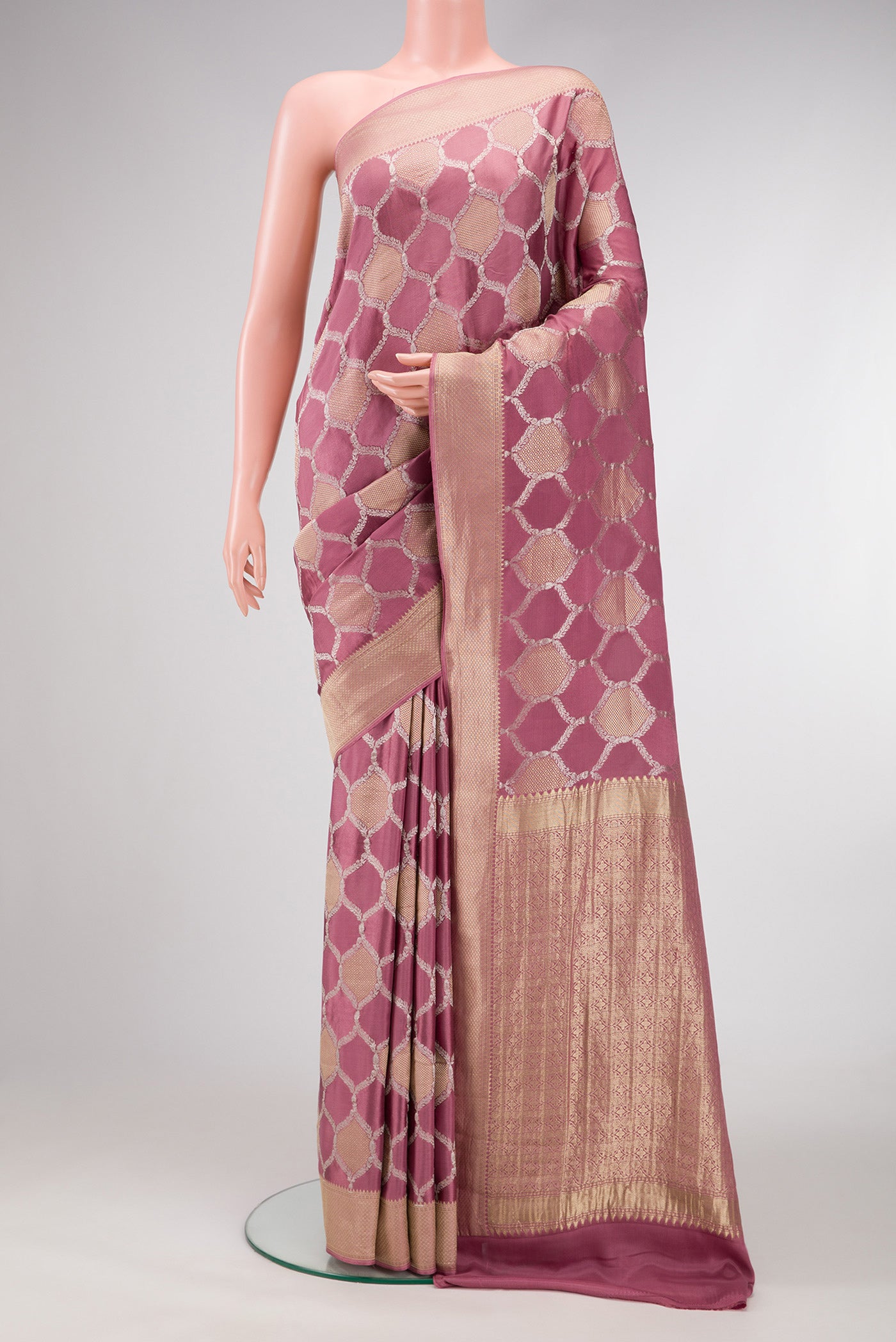 Pink Dual Tone Mysore Georgette Saree with Zari Brocade on the body and Zari Border.  displayed on a mannequin