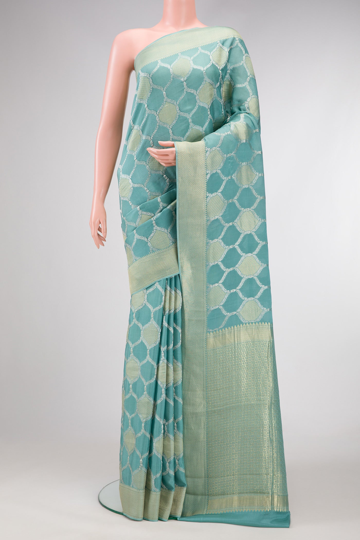 Maya Blue Dual Tone Mysore Georgette Saree with Zari Brocade on the body and Zari Border.  displayed on a mannequin