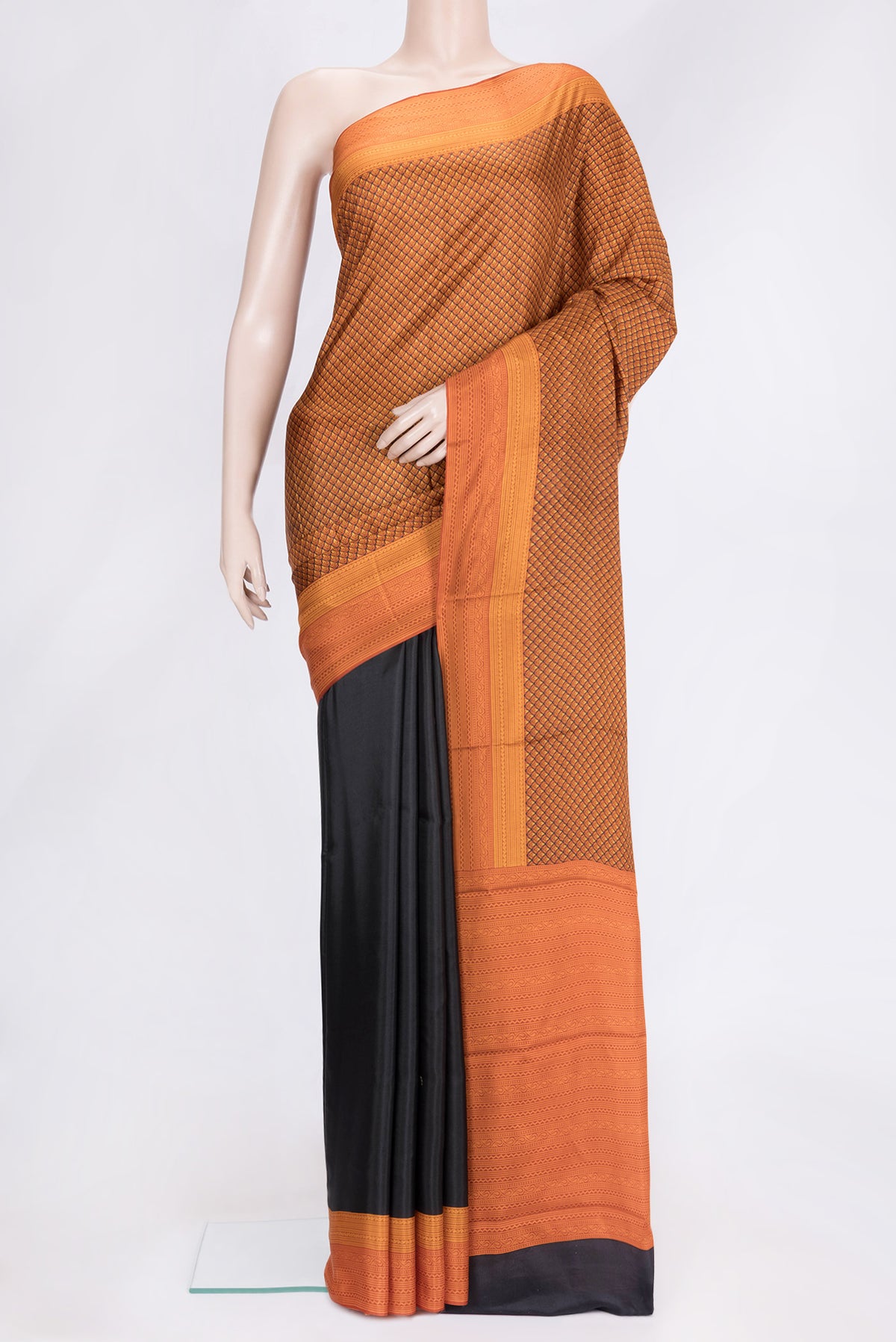 Orange Dual Tone Printed Silk Saree with Printed design on the body and Printed Border.  displayed on a mannequin