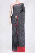 Black Dual Tone Printed Silk Saree with Printed design on the body and Plain Border.  displayed on a mannequin
