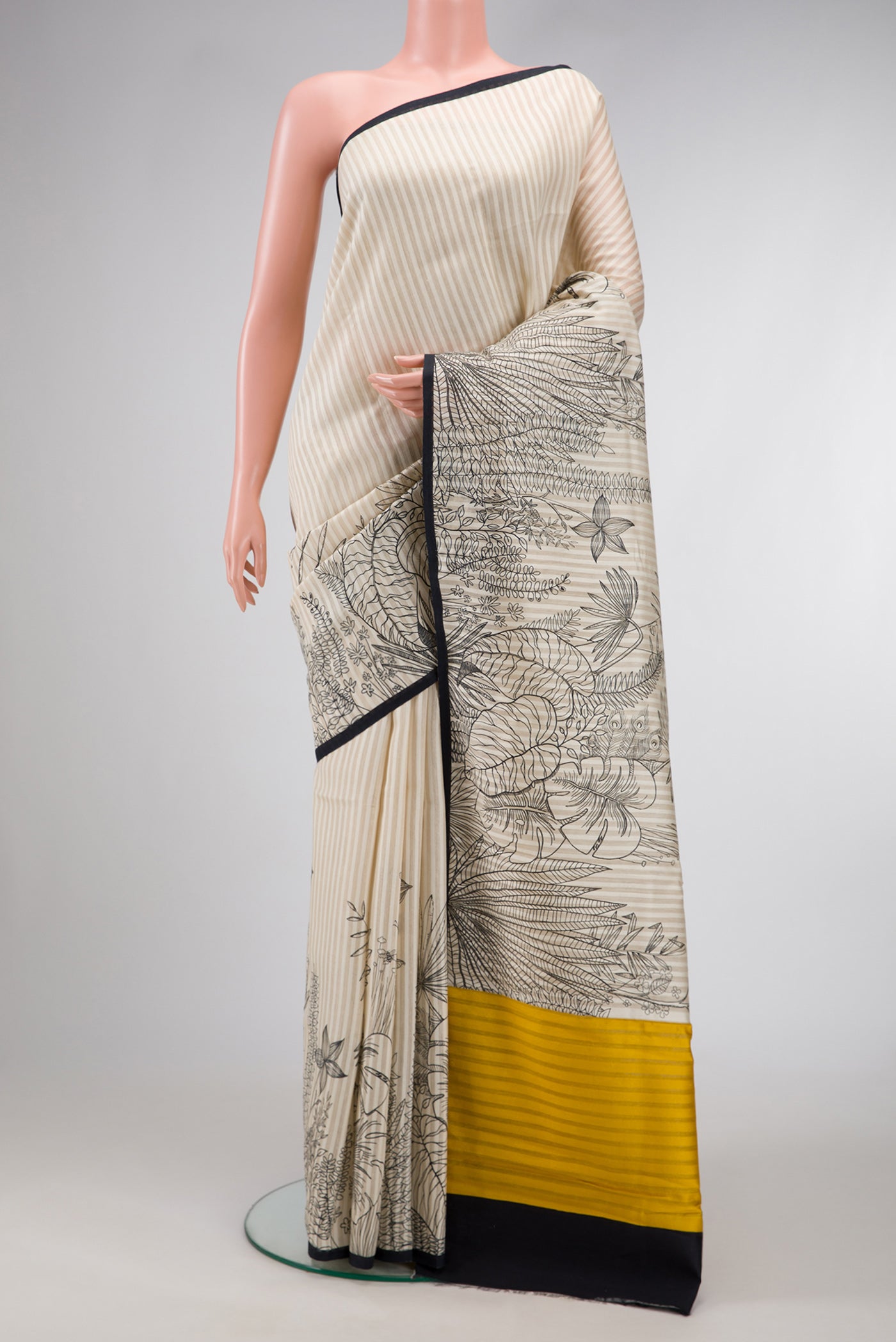 Beige Dual Tone Tussar Silk Saree with Stripes on the body and Fancy Border.  displayed on a mannequin