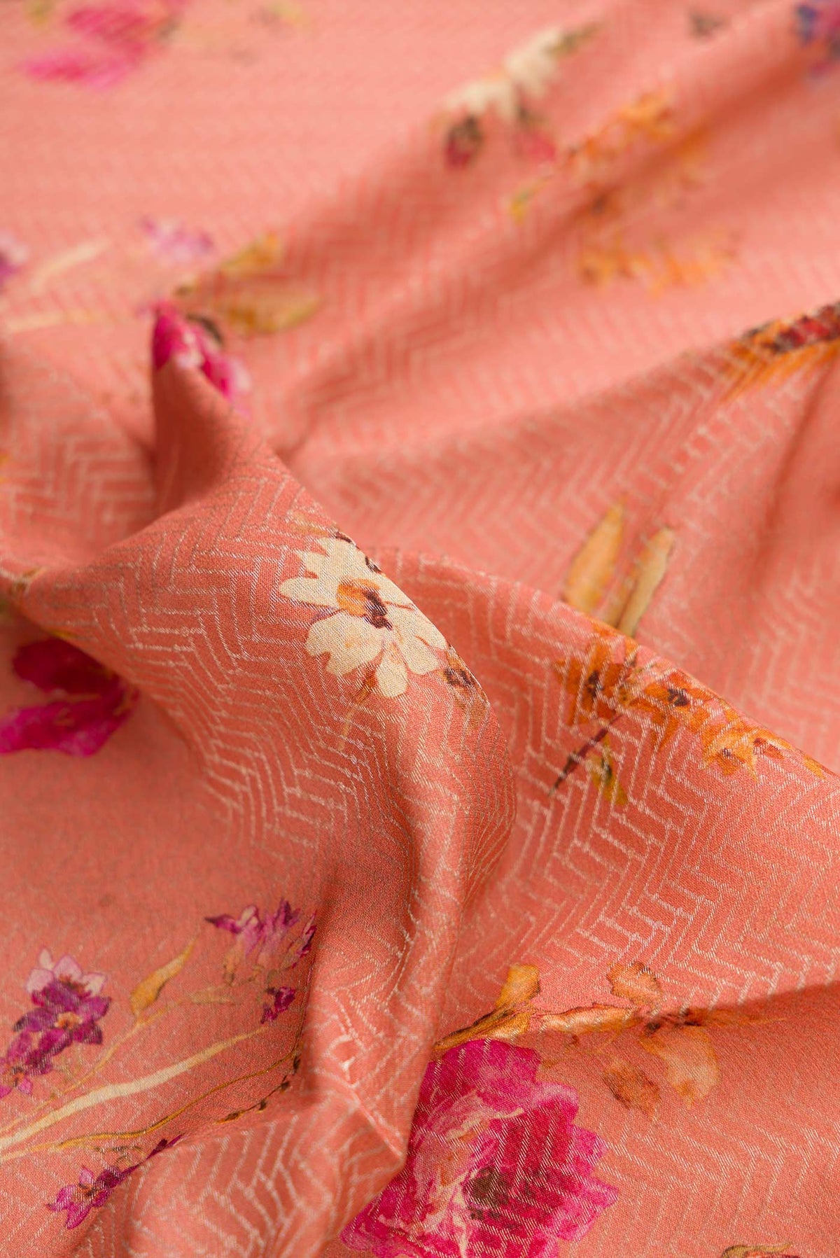 Close up of Rose Gold Dual Tone Mysore Georgette Saree with Zari Brocade on the body and Zari Border displaying folds