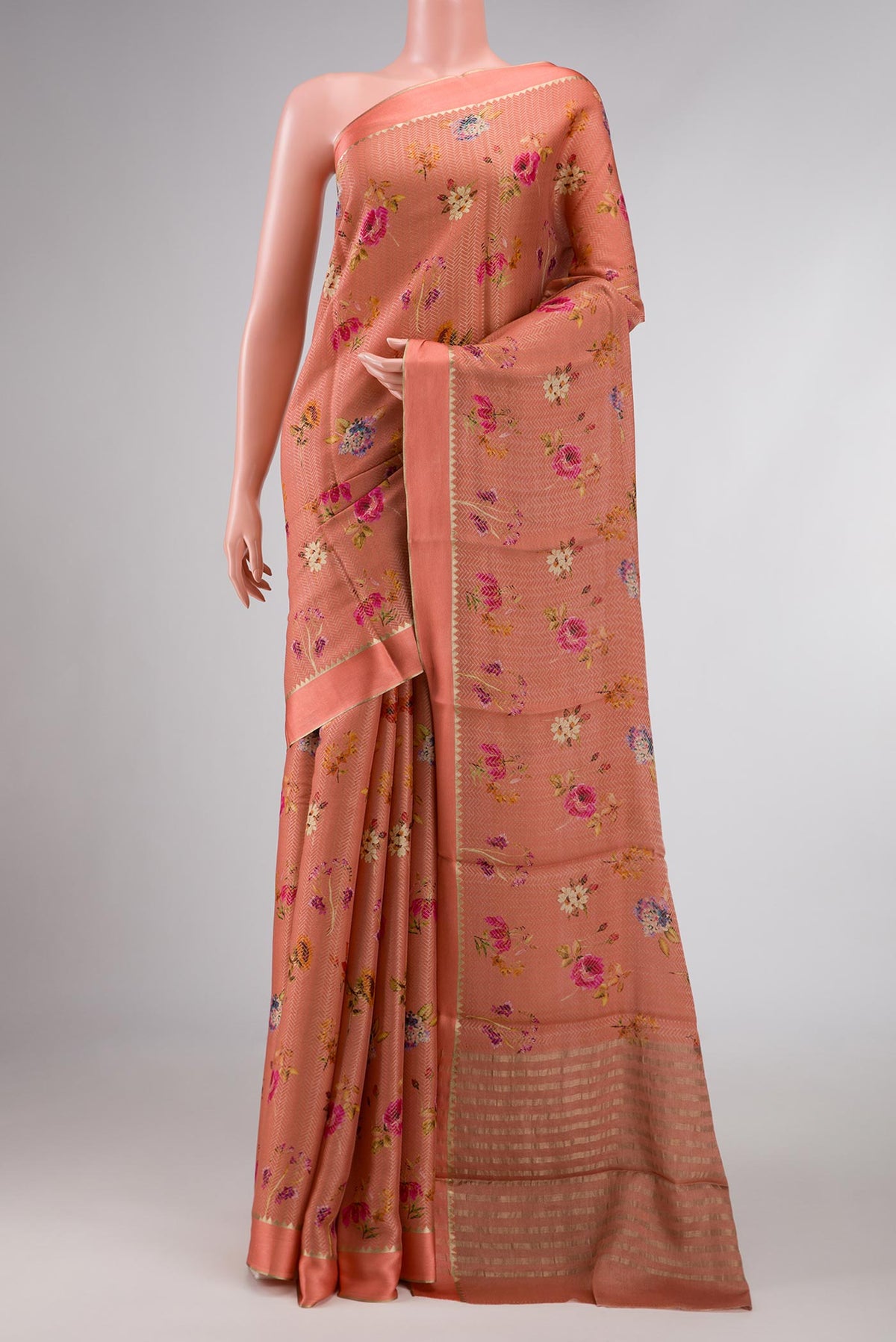 Rose Gold Dual Tone Mysore Georgette Saree with Zari Brocade on the body and Zari Border displayed on a mannequin
