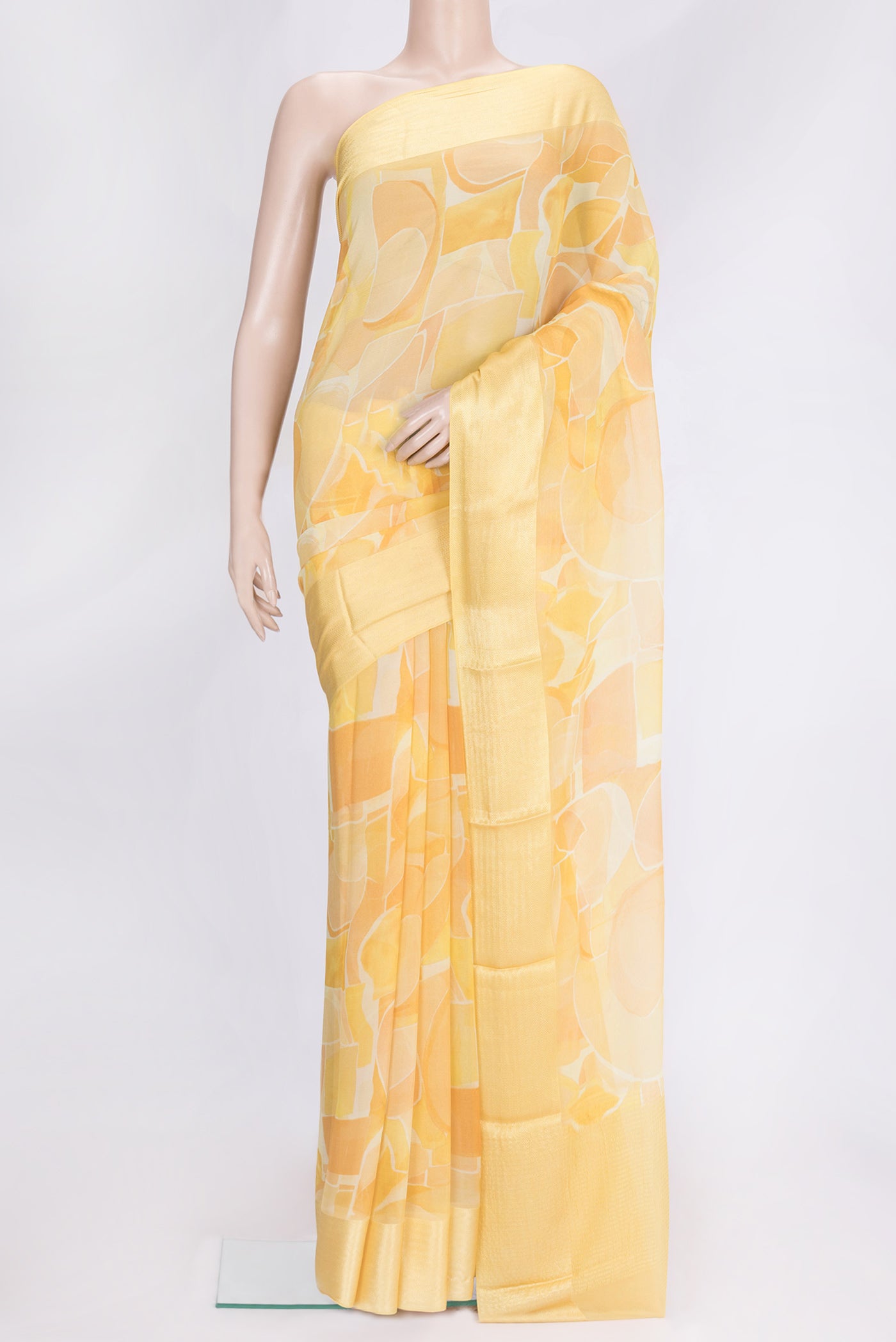 Sandal Dual Tone Mysore Georgette Saree with Printed design on the body and Thread Border.  displayed on a mannequin