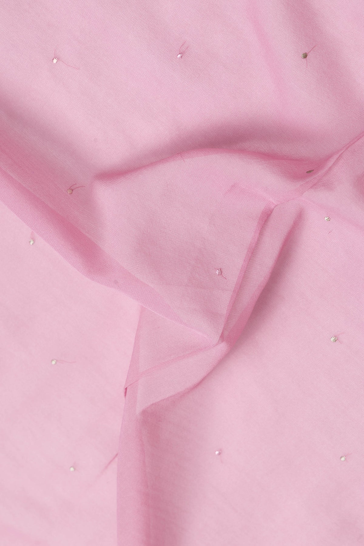 Close up of Pink Dual Tone Georgette Saree with Embroidery on the body and Embroidery Border.  displaying folds