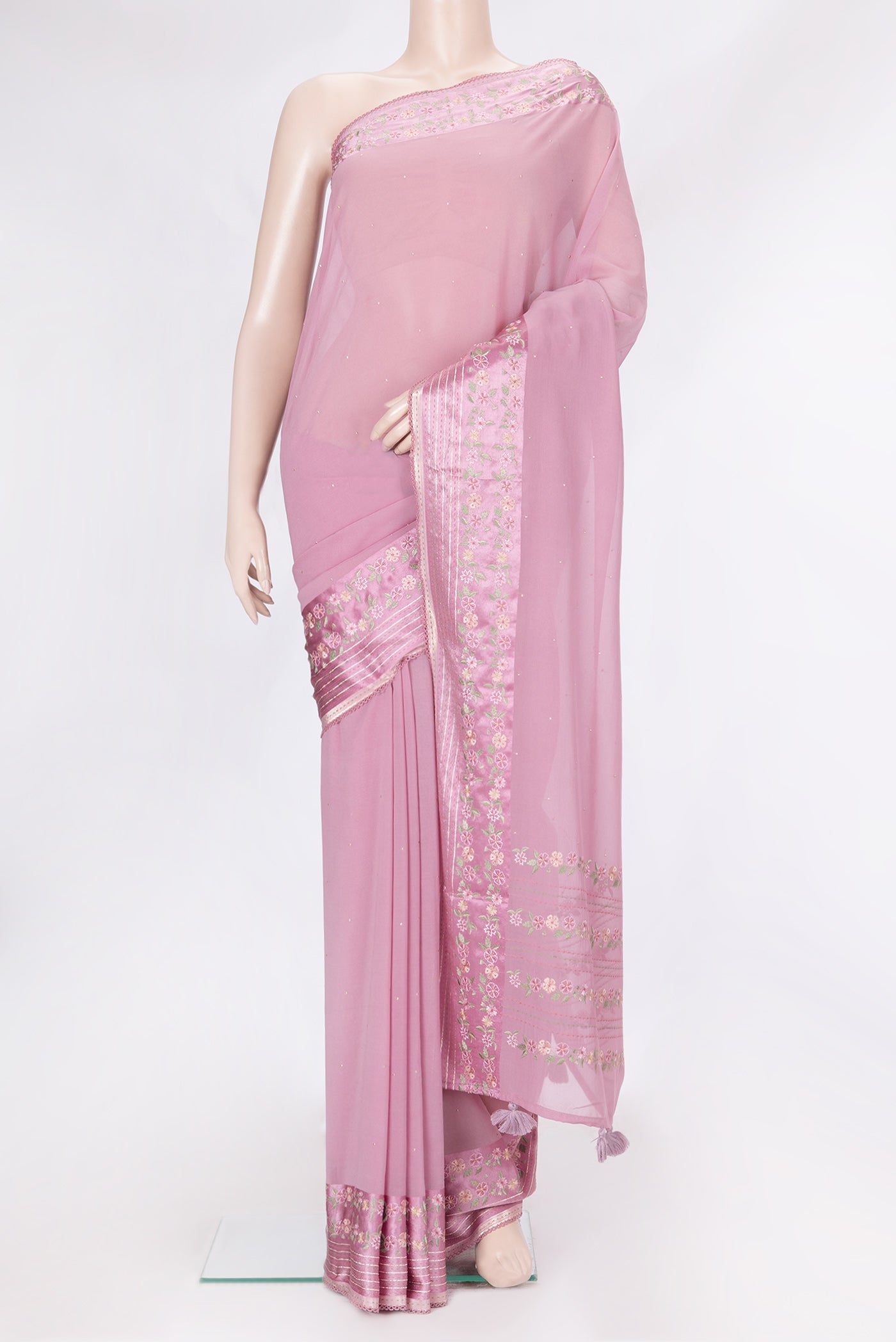 Pink Dual Tone Georgette Saree with Embroidery on the body and Embroidery Border.  displayed on a mannequin