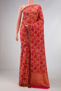 Beige Dual Tone Mysore Georgette Saree with Printed design on the body and Thread Border displayed on a mannequin