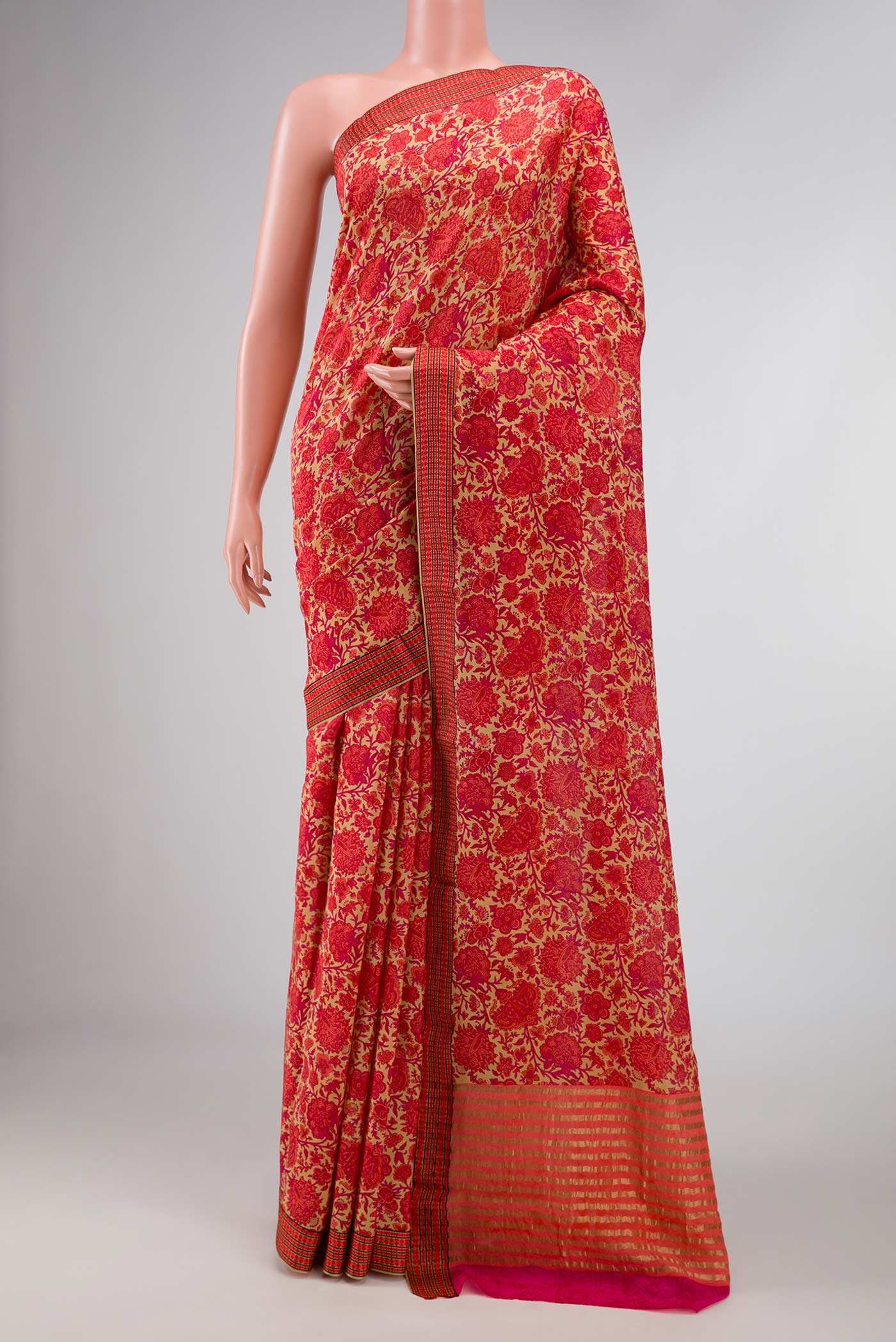 Beige Dual Tone Mysore Georgette Saree with Printed design on the body and Thread Border displayed on a mannequin