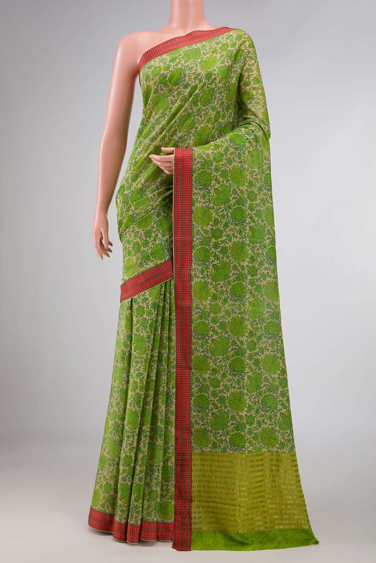 Green Dual Tone Mysore Crepe Saree with Printed design on the body and Thread Border displayed on a mannequin