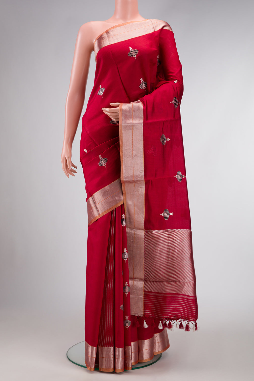Burgundy Dual Tone Banarasi Silk Saree with Stripes on the body and Thin Zari Line.  displayed on a mannequin