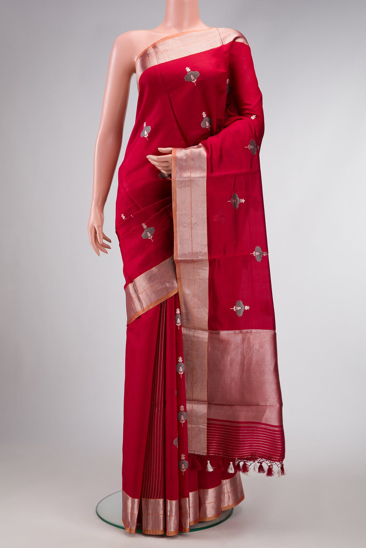 Burgundy Dual Tone Banarasi Silk Saree with Stripes on the body and Thin Zari Line.  displayed on a mannequin