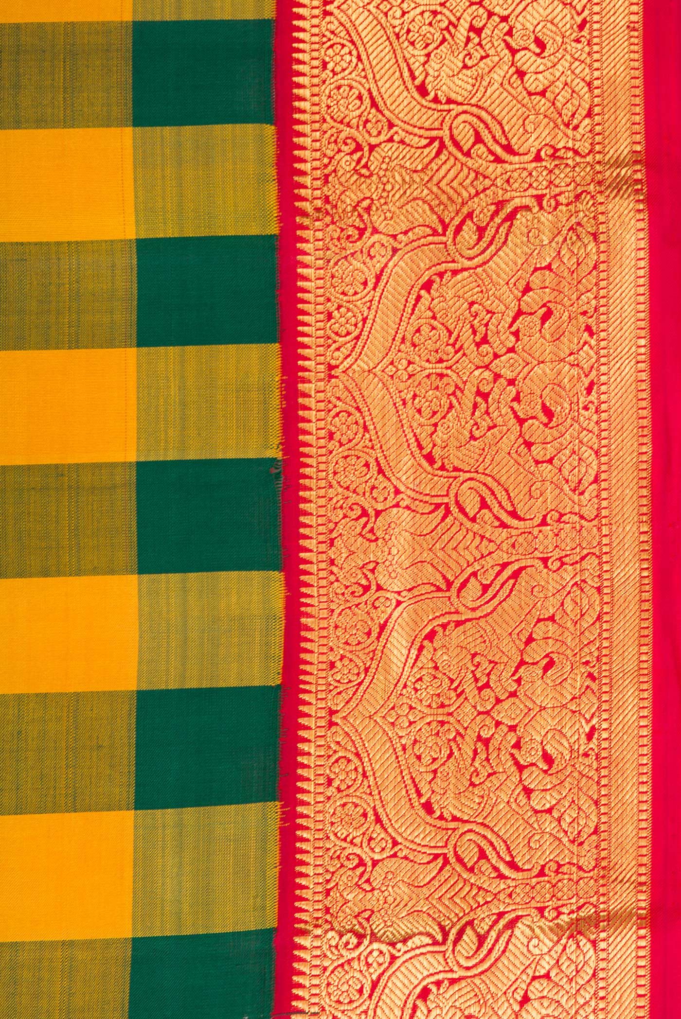 Border image of Pure Silk Pure Zari Green and Mustard Color Kanjivaram Saree with Checked design on the body and Zari Border. 
