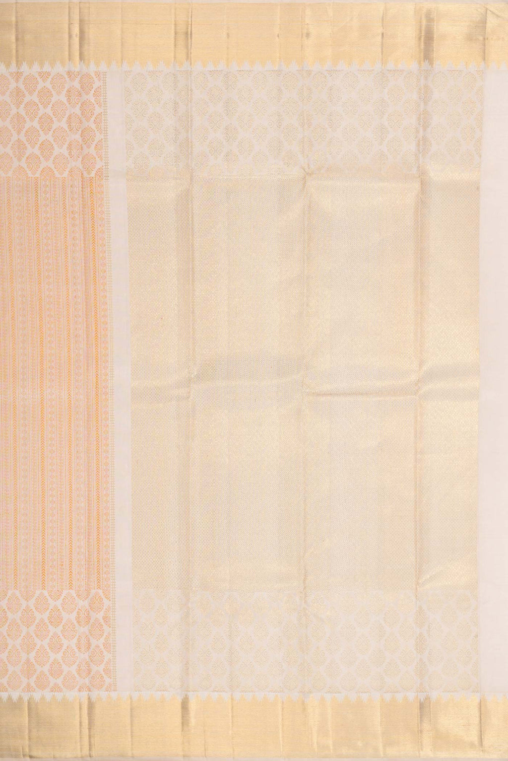 Close up image of the pallu of Beige Dual Tone Kanchipuram Silk Saree with Zari Butta on the body and Zari Border. 