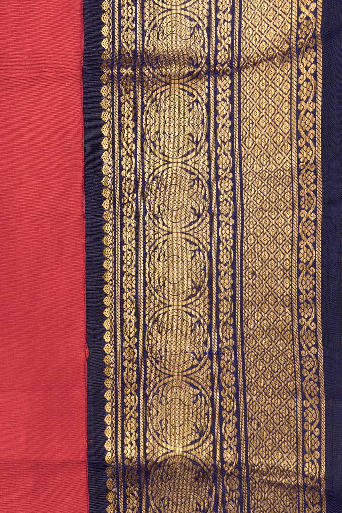 Border image of Red Dual Tone Kanjivaram Silk Saree with Zari Butta on the body and Zari Border. 