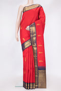 Red Dual Tone Kanjivaram Silk Saree with Zari Butta on the body and Zari Border.  displayed on a mannequin