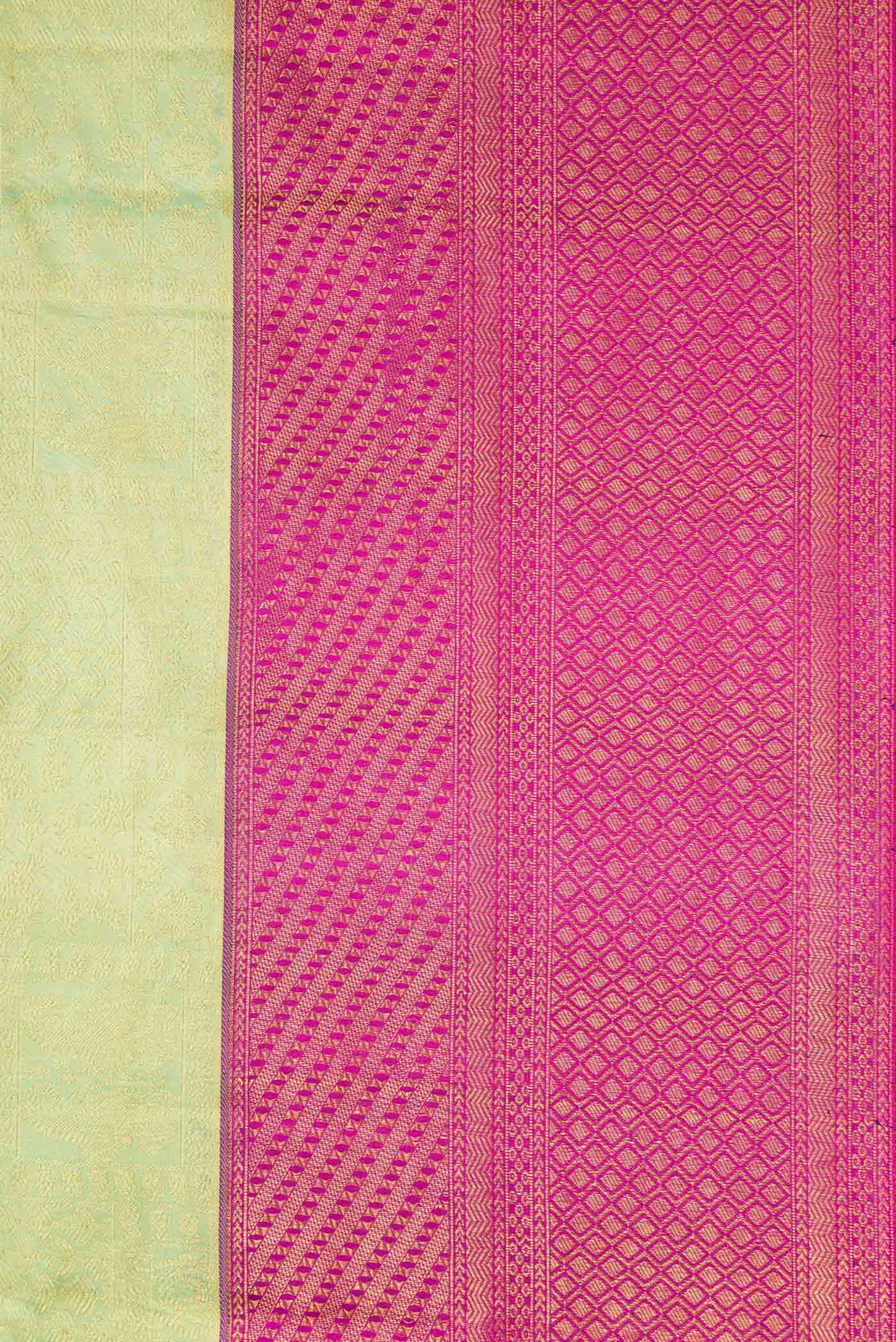 Border image of Pista Green Dual Tone Kanchipuram Silk Saree with Zari Brocade on the body and Zari Border. 