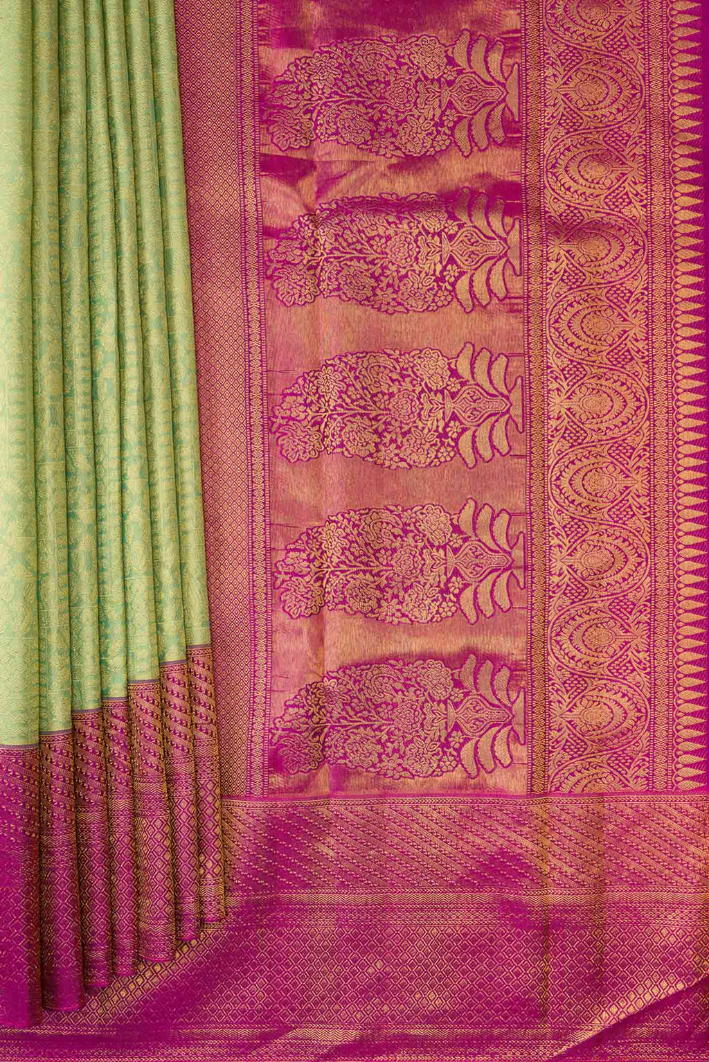 Pleats and pallu of Pista Green Dual Tone Kanchipuram Silk Saree with Zari Brocade on the body and Zari Border. 
