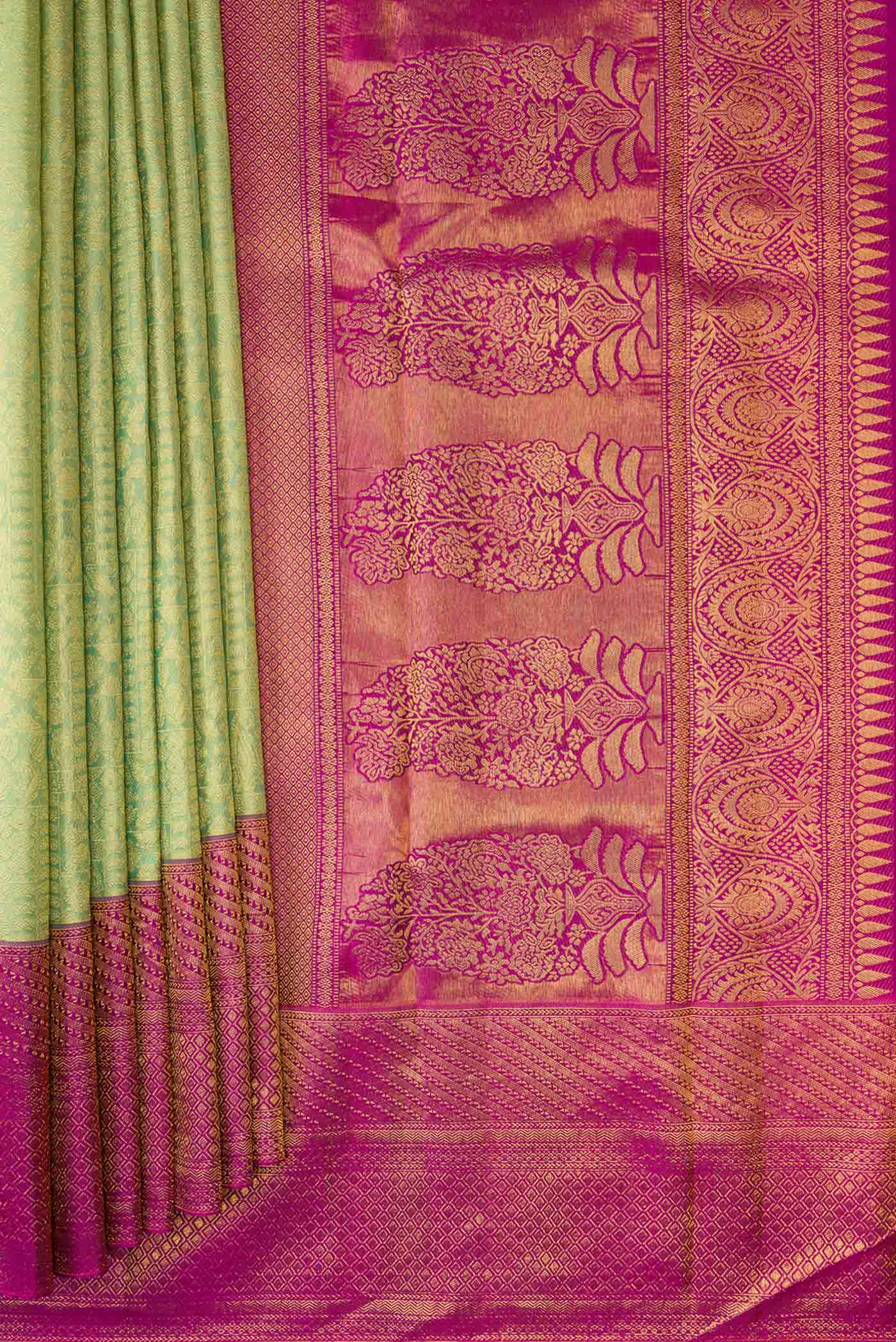 Pleats and pallu of Pista Green Dual Tone Kanchipuram Silk Saree with Zari Brocade on the body and Zari Border. 