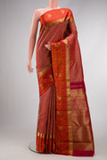 Pure Silk Pure Zari Maroon Dual Tone Kanchipuram Saree with Jacquard design on the body and Fancy Border.  displayed on a mannequin