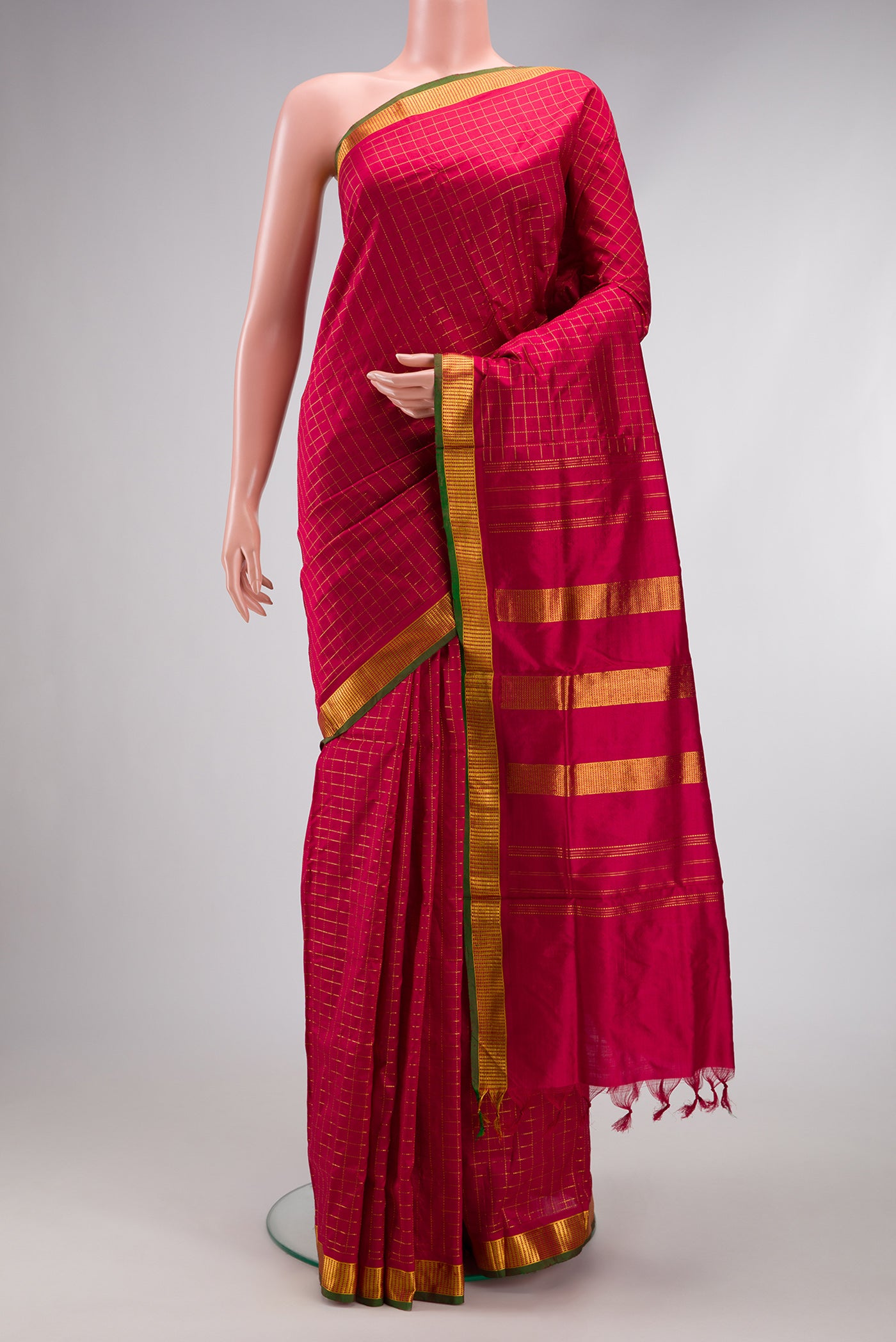 Maroon Kanchipuram Silk Nine Yards Saree with Checked design on the body and Zari Border.  displayed on a mannequin