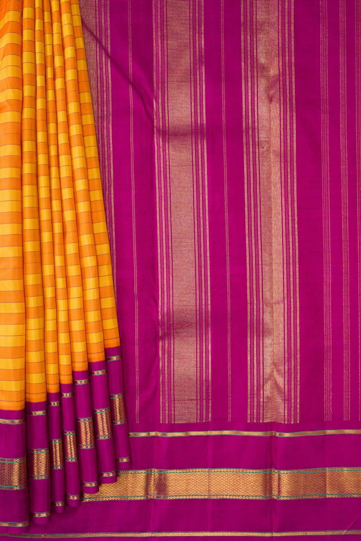 Pleats and pallu of Mustard and Orange Color Kanjivaram Silk Saree with Stripes on the body and Zari Border. 