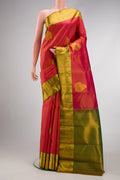 Dark Pink Dual Tone Kanchipuram Silk Saree with Jacquard With Zari Butta on the body and Zari Border.  displayed on a mannequin