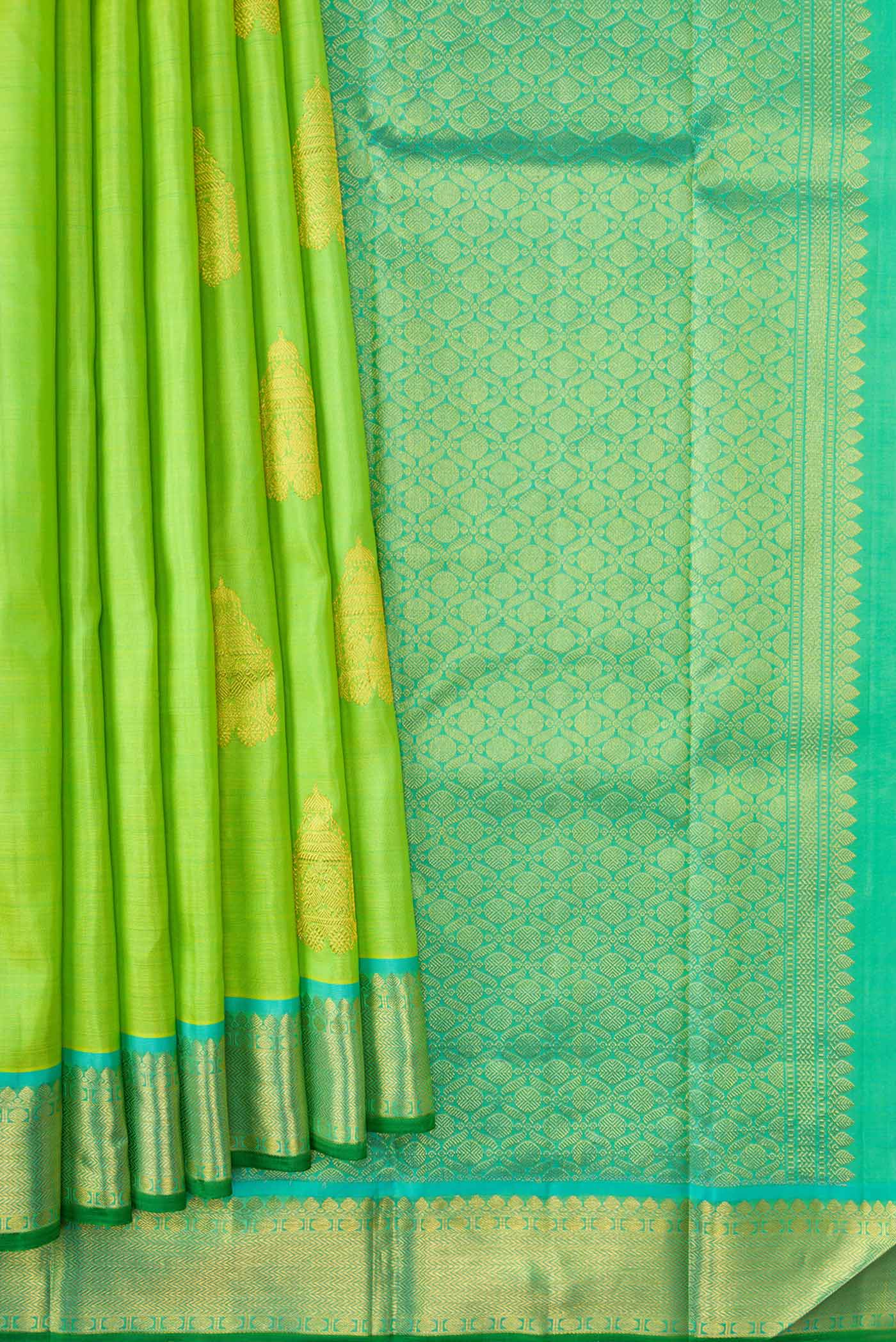 Pleats and pallu of Parrot Green Dual Tone Kanchipuram Silk Saree with Zari Butta on the body and Zari Border. 