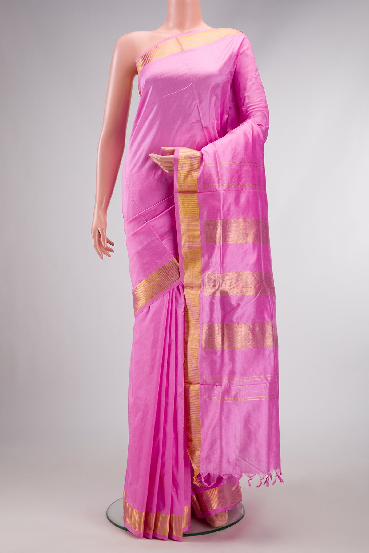 Pink Dual Tone Kanchipuram Silk Nine Yards Saree with Plain Body and Zari Border.  displayed on a mannequin