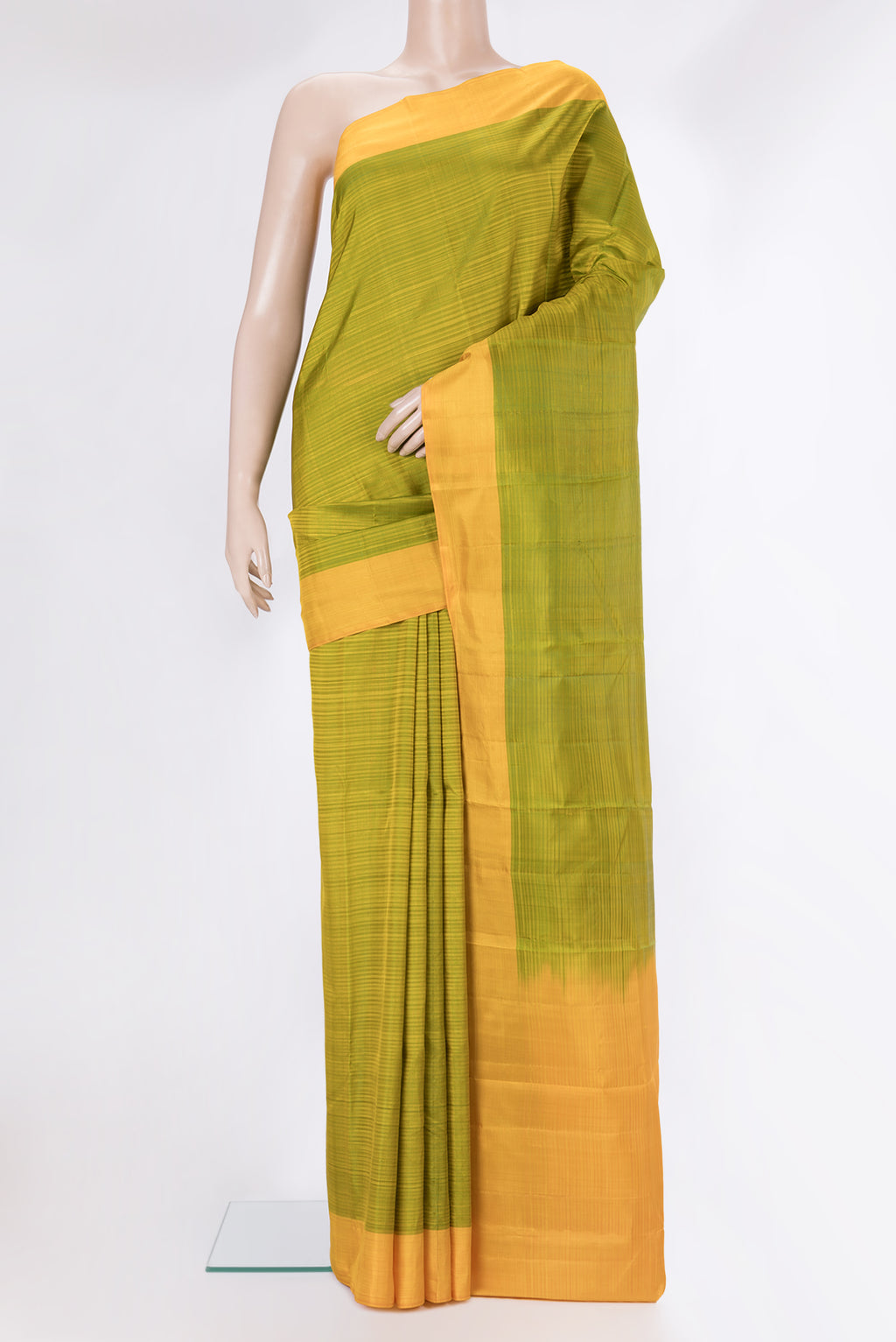 Pure Silk Parrot Green Kanchipuram Saree with Stripes on the body and Plain Border.  displayed on a mannequin