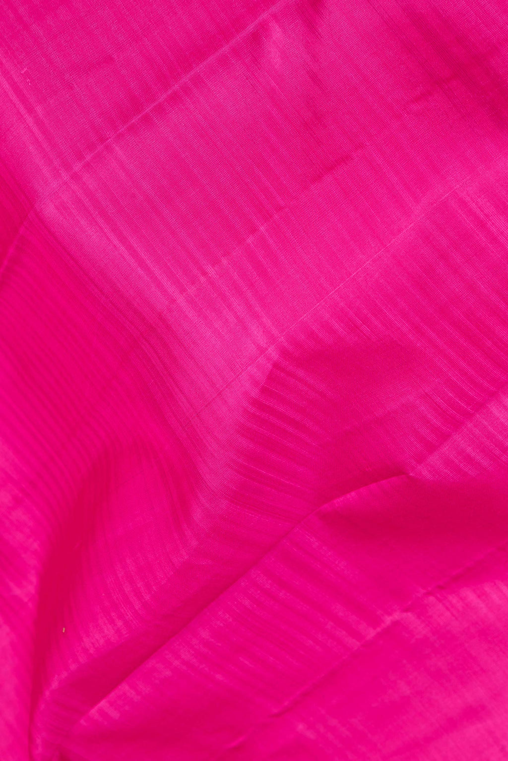 Close up of Pure Silk Pink Kanchipuram Saree with Stripes on the body and Plain Border.  displaying folds