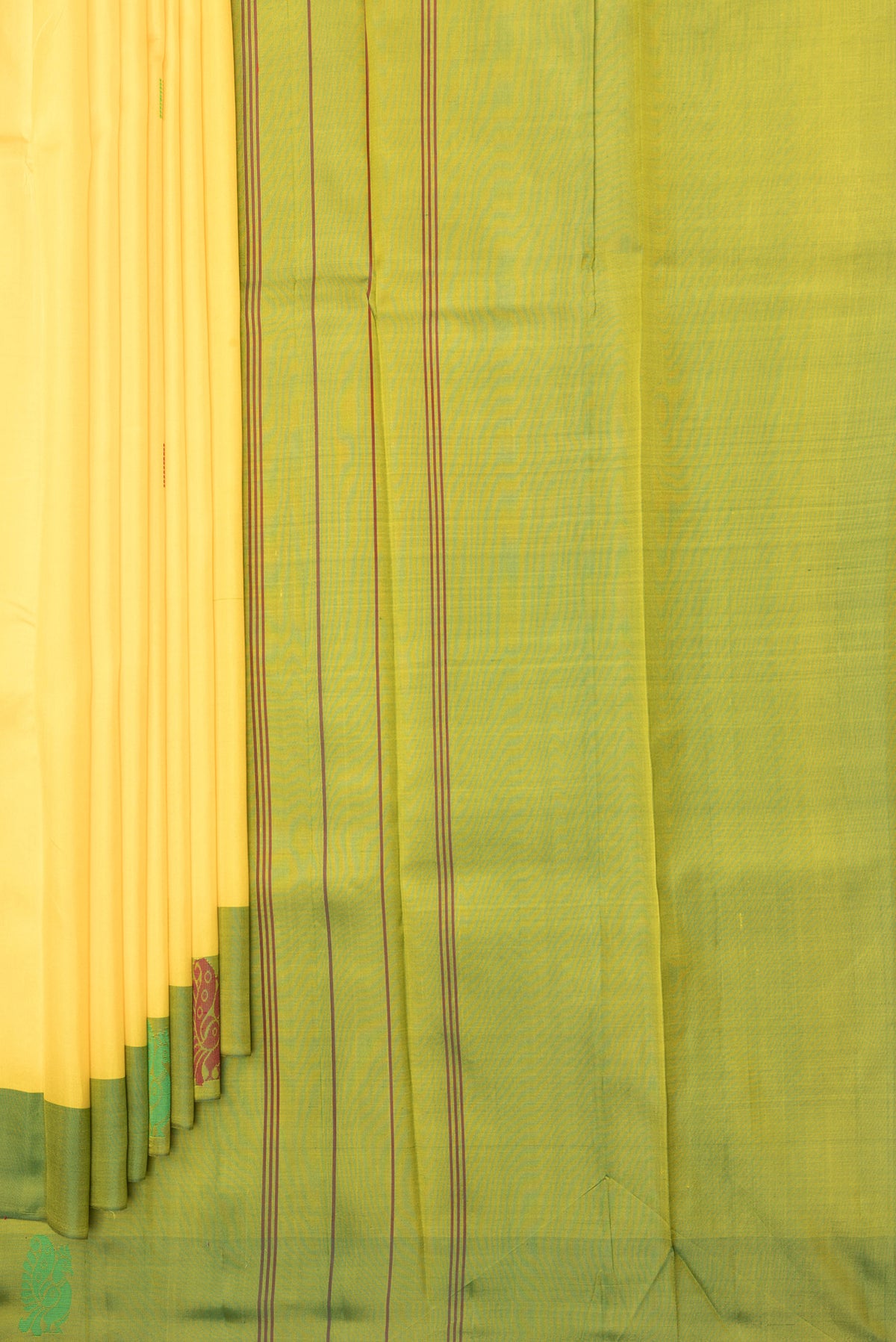 Pleats and pallu of Pure Silk Yellow Kanchipuram Saree with Thread Butta on the body and Thread Border. 