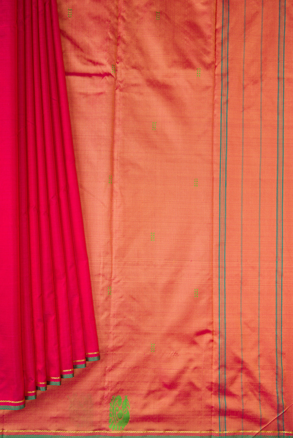 Pleats and pallu of Maroon Kanchipuram Silk Saree with Thread Butta on the body and Fancy Border. 