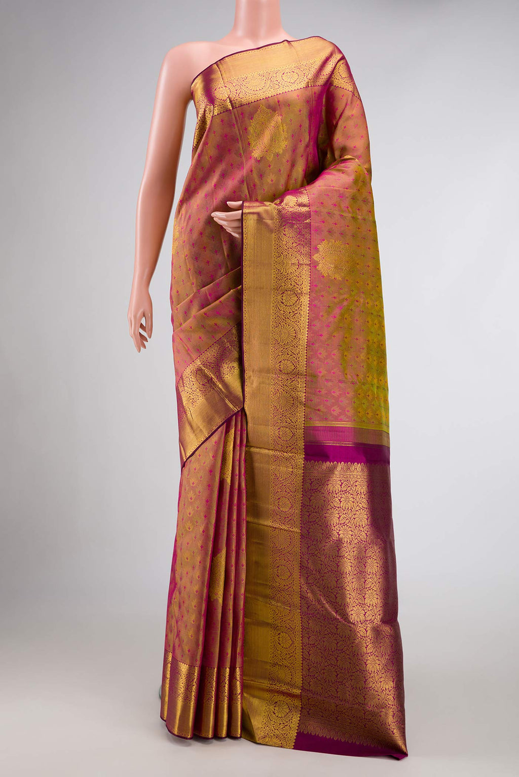 Mehandi Green Dual Tone Kanchipuram Silk Saree with Jacquard design on the body and Zari Border.  displayed on a mannequin