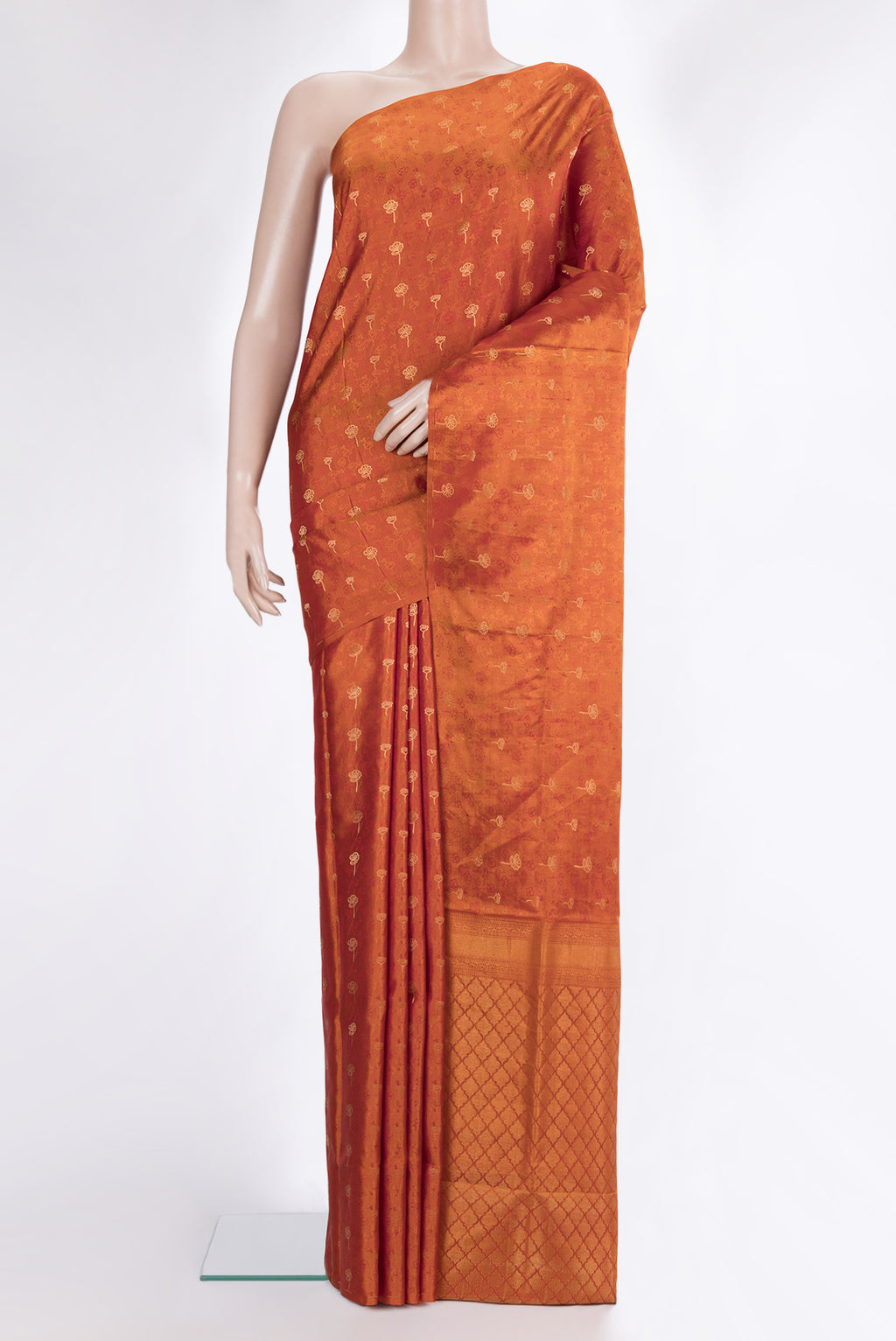 Pure Silk Orange Soft Saree with Jacquard With Zari Butta on the body and Without Border.  displayed on a mannequin