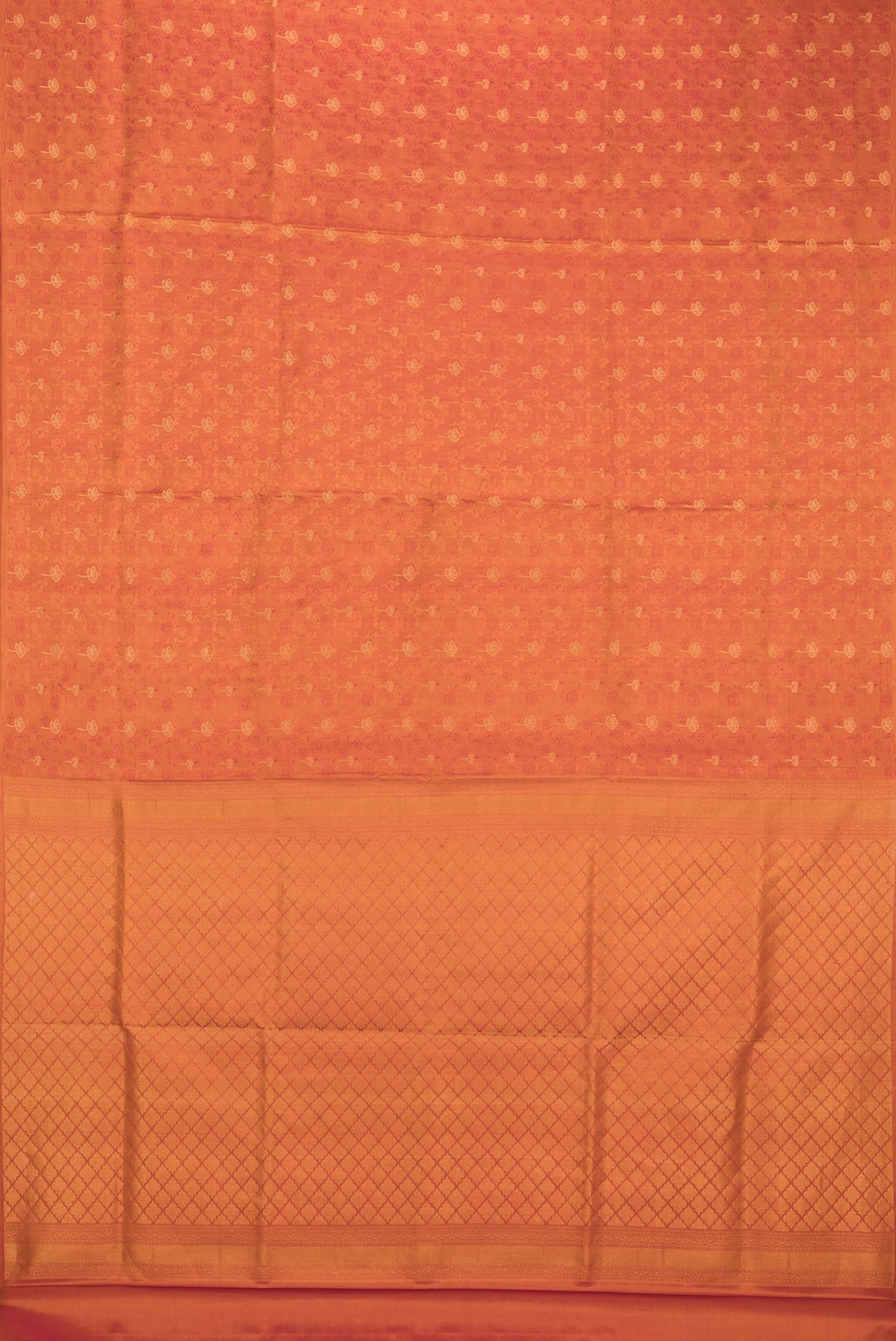 Flat view of Pure Silk Orange Soft Saree with Jacquard With Zari Butta on the body and Without Border. 