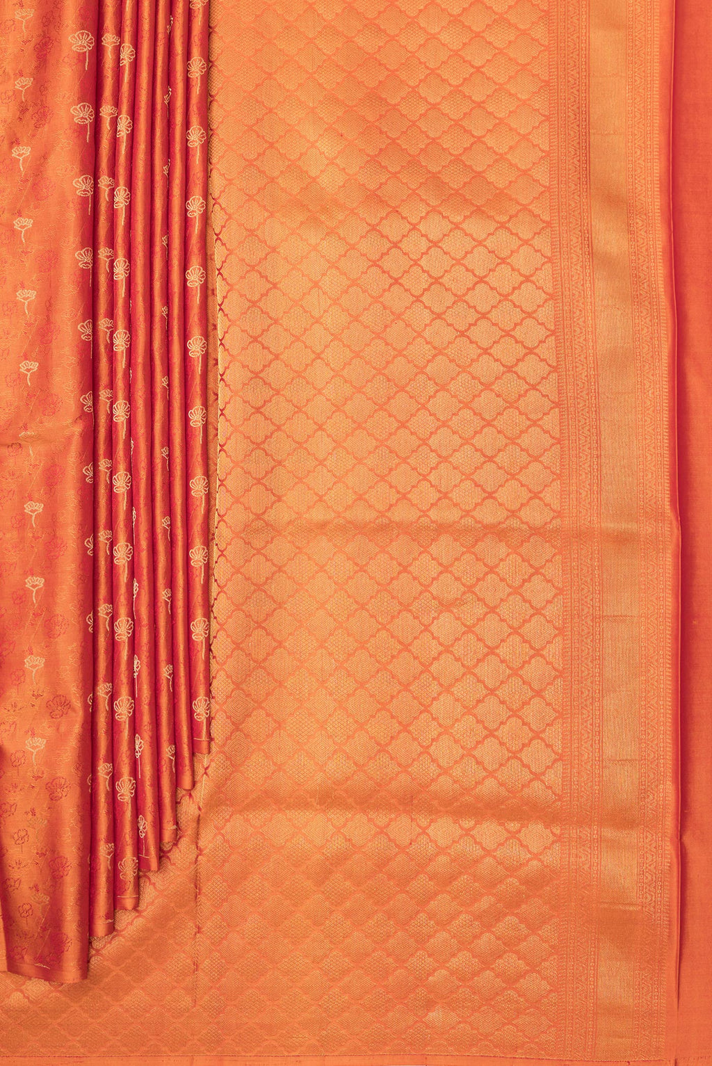 Pleats and pallu of Pure Silk Orange Soft Saree with Jacquard With Zari Butta on the body and Without Border. 