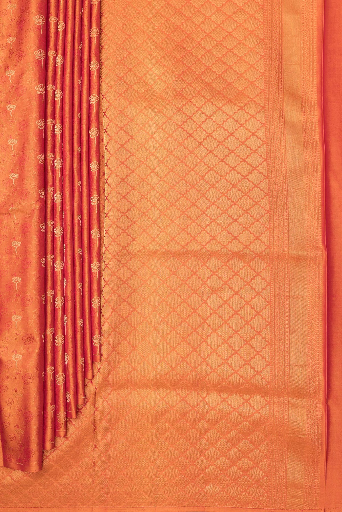 Pleats and pallu of Pure Silk Orange Soft Saree with Jacquard With Zari Butta on the body and Without Border. 