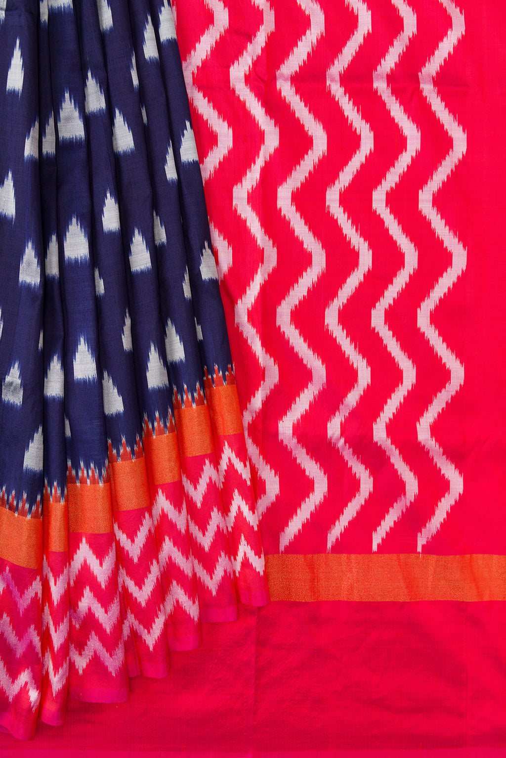 Pleats and pallu of Navy Blue Dual Tone Double Ikat Saree with Ikat Print on the body and Zari Border. 