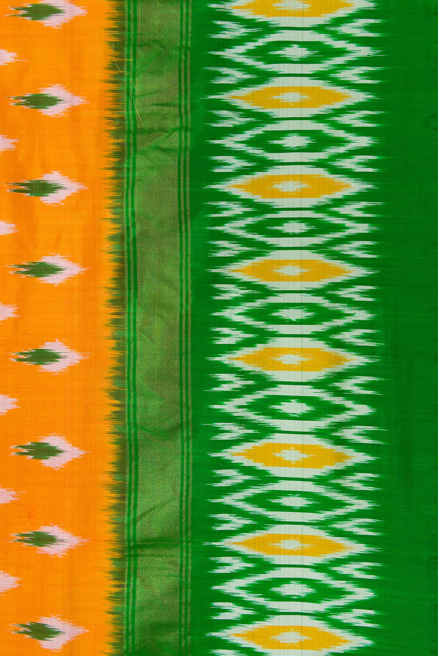 Border image of Mustard Dual Tone Double Ikat Saree with Ikat Print on the body and Zari Border. 