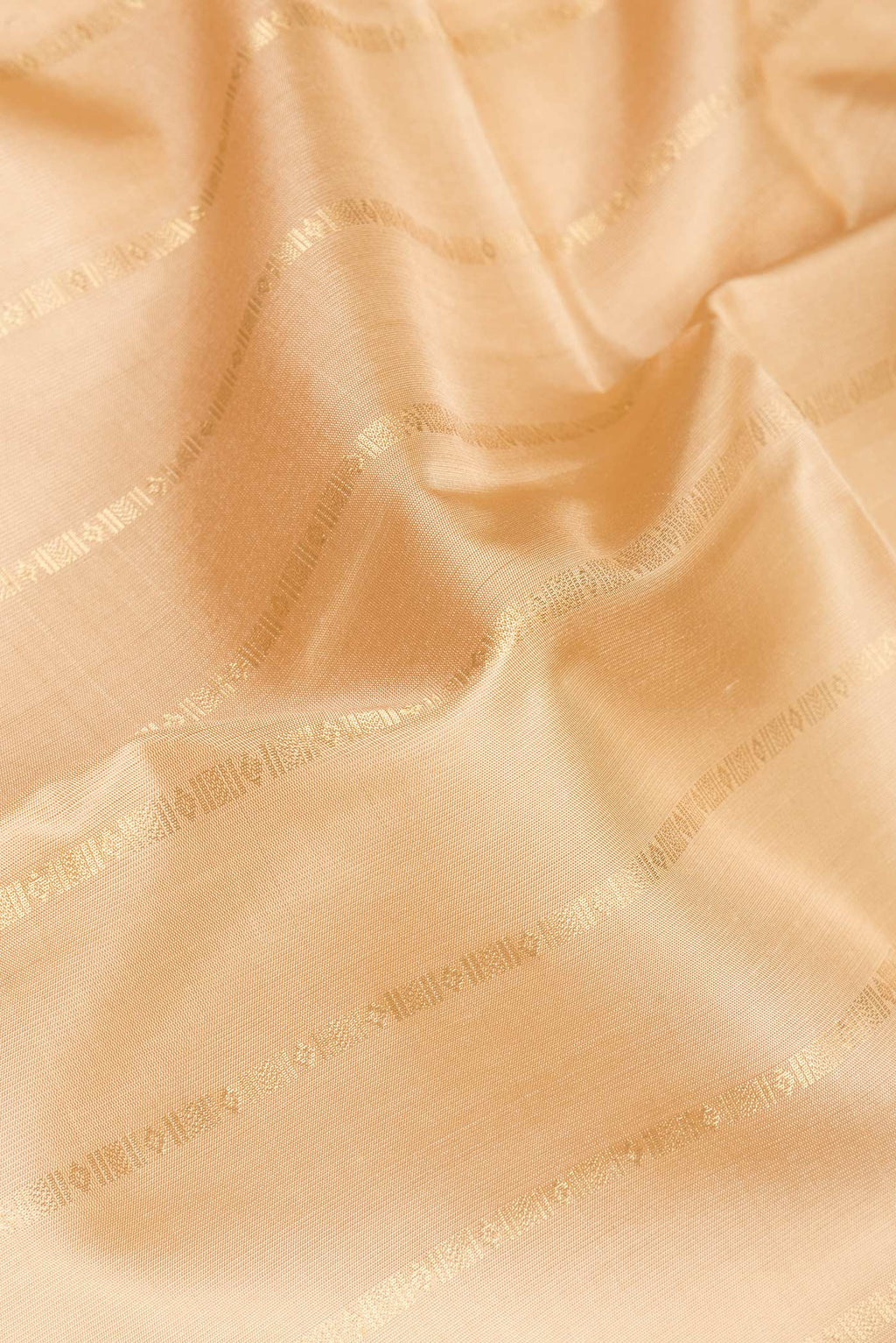 Close up of Sandal Soft Silk Saree with Stripes on the body and Without Border.  displaying folds