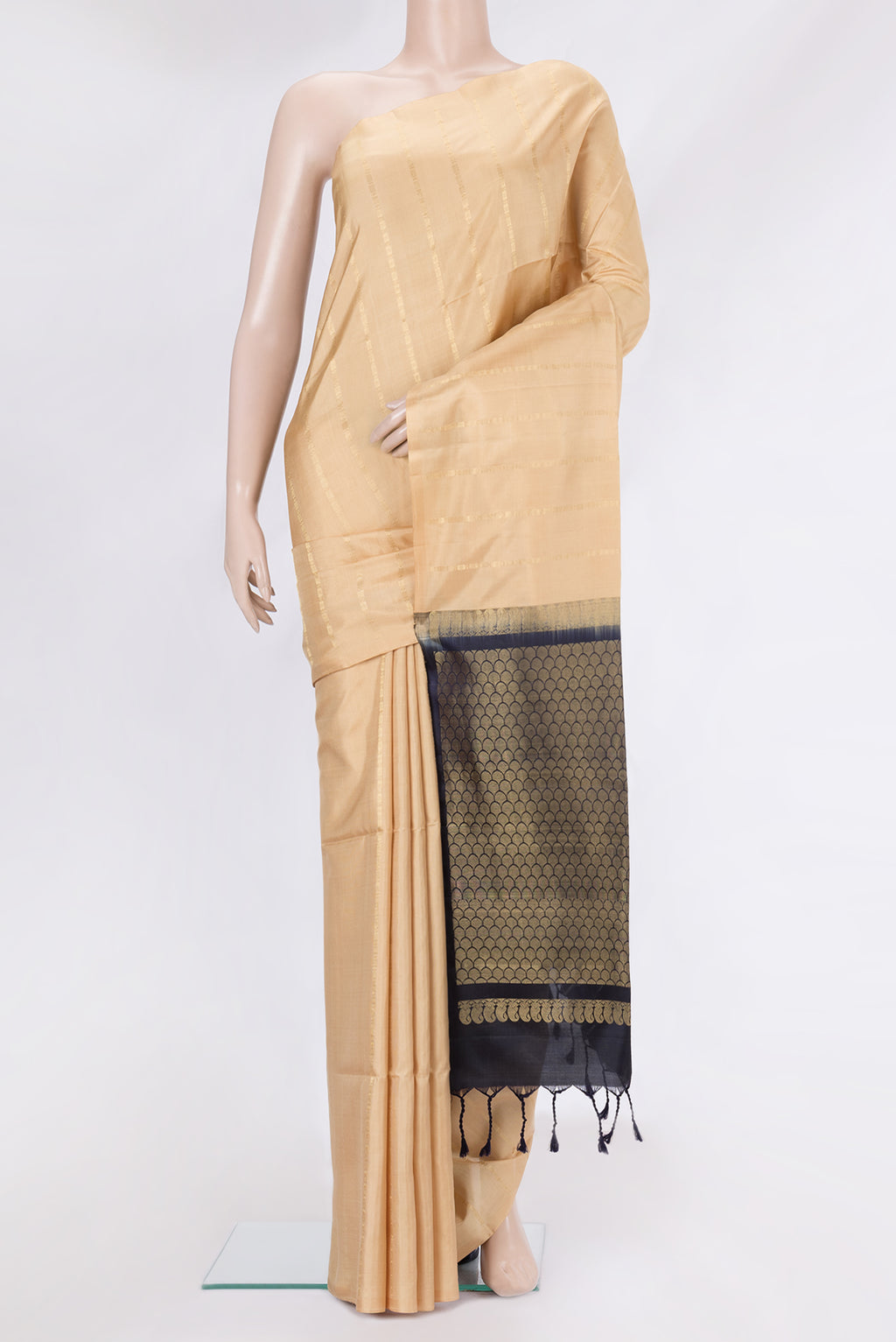 Sandal Soft Silk Saree with Stripes on the body and Without Border.  displayed on a mannequin