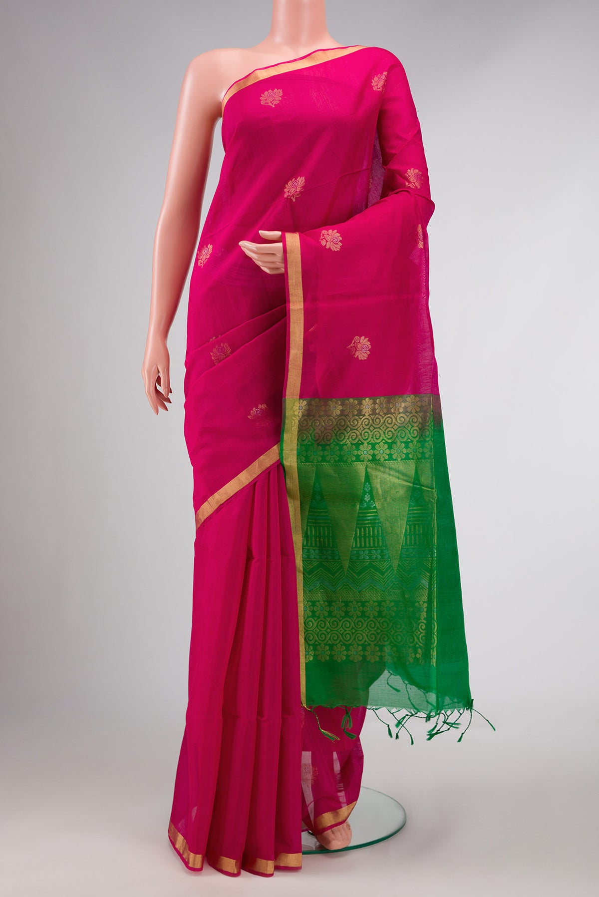 Pink Dual Tone Silk Cotton Saree with Zari Butta on the body and Zari Border displayed on a mannequin